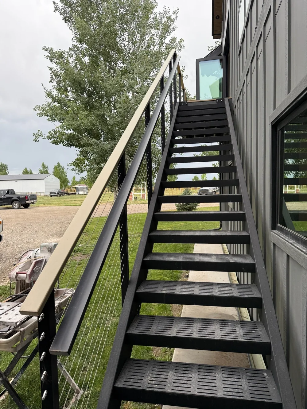 Exterior stair, mesh guard