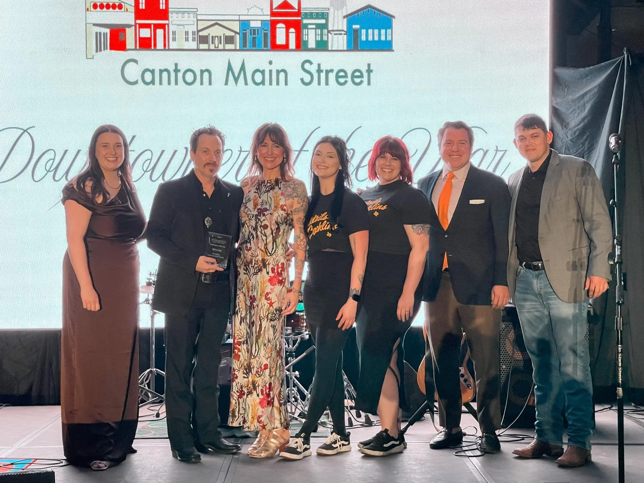 Ryan Sumner of Native Son accepting the Downtowner of the Year Award at Canton Main Street