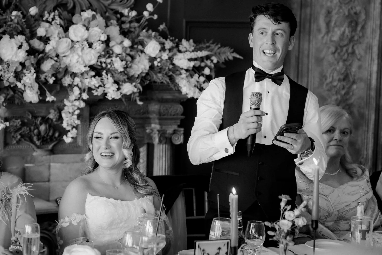 Jonathon giving his speech while Ciara laughs beside him.