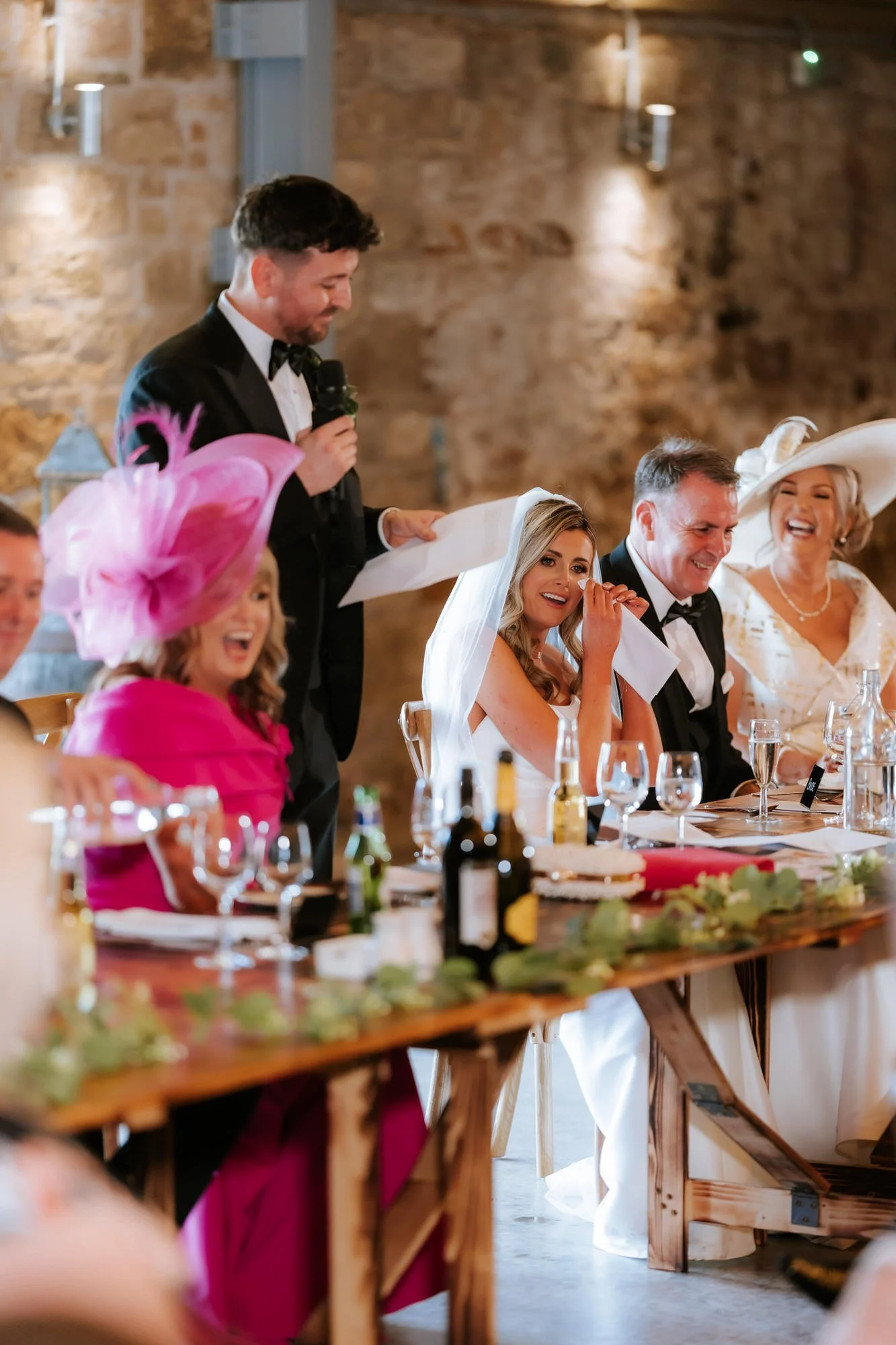 Natalie reacting emotionally while Jamie gives his wedding speech