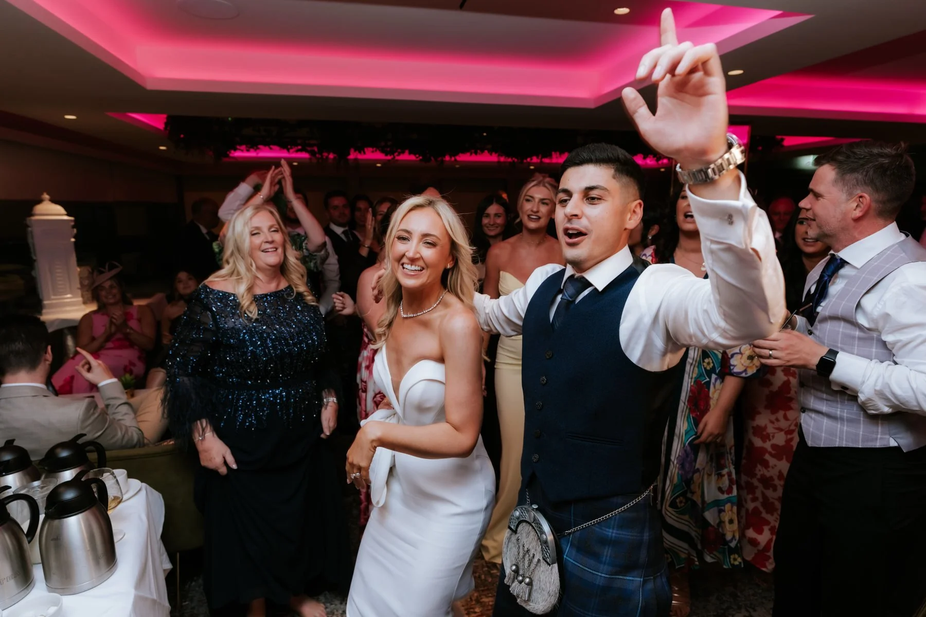 Lauren and Zen singing along with their guests during the evening party.