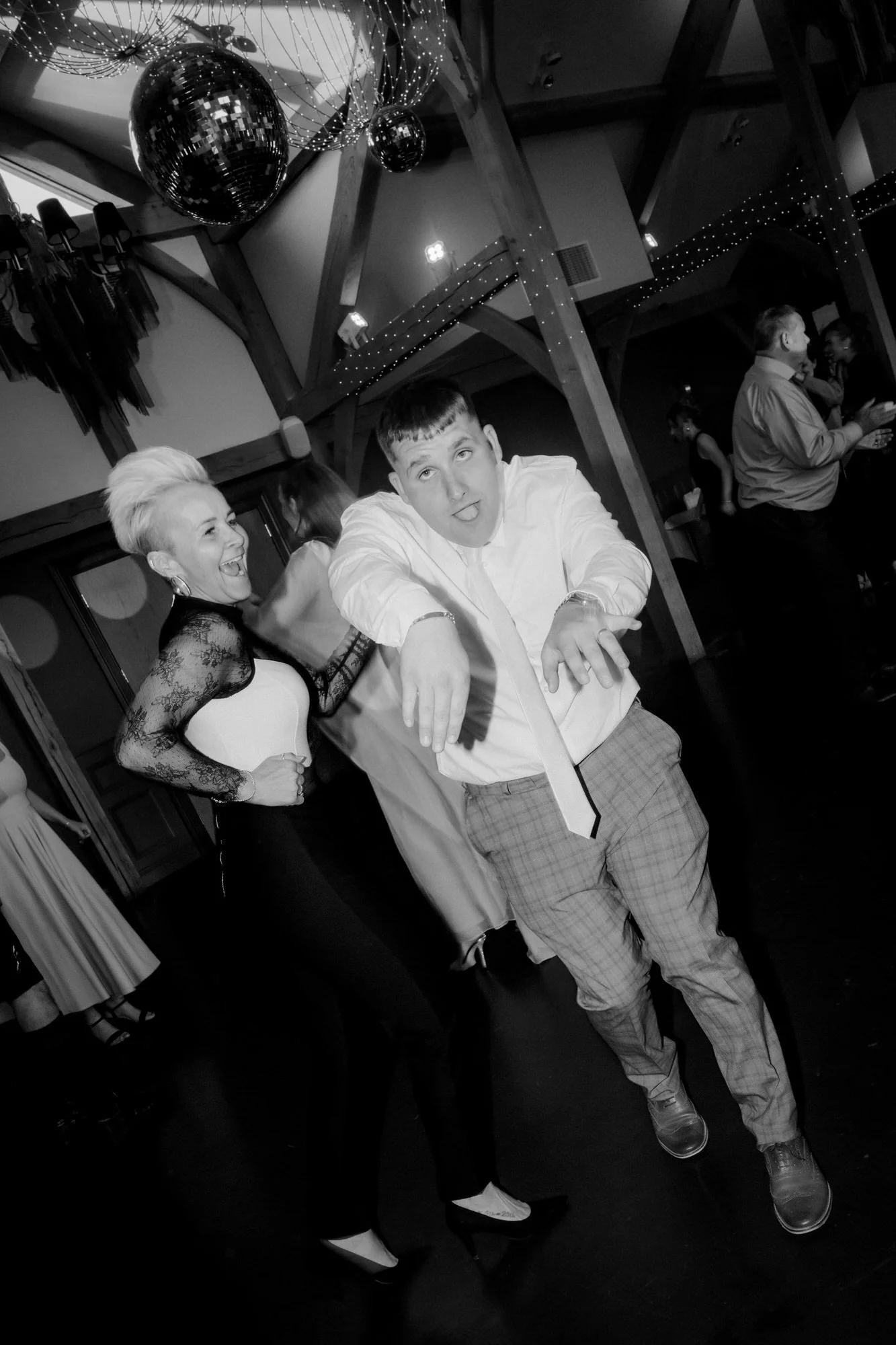 Guests having fun together on the evening dance floor.