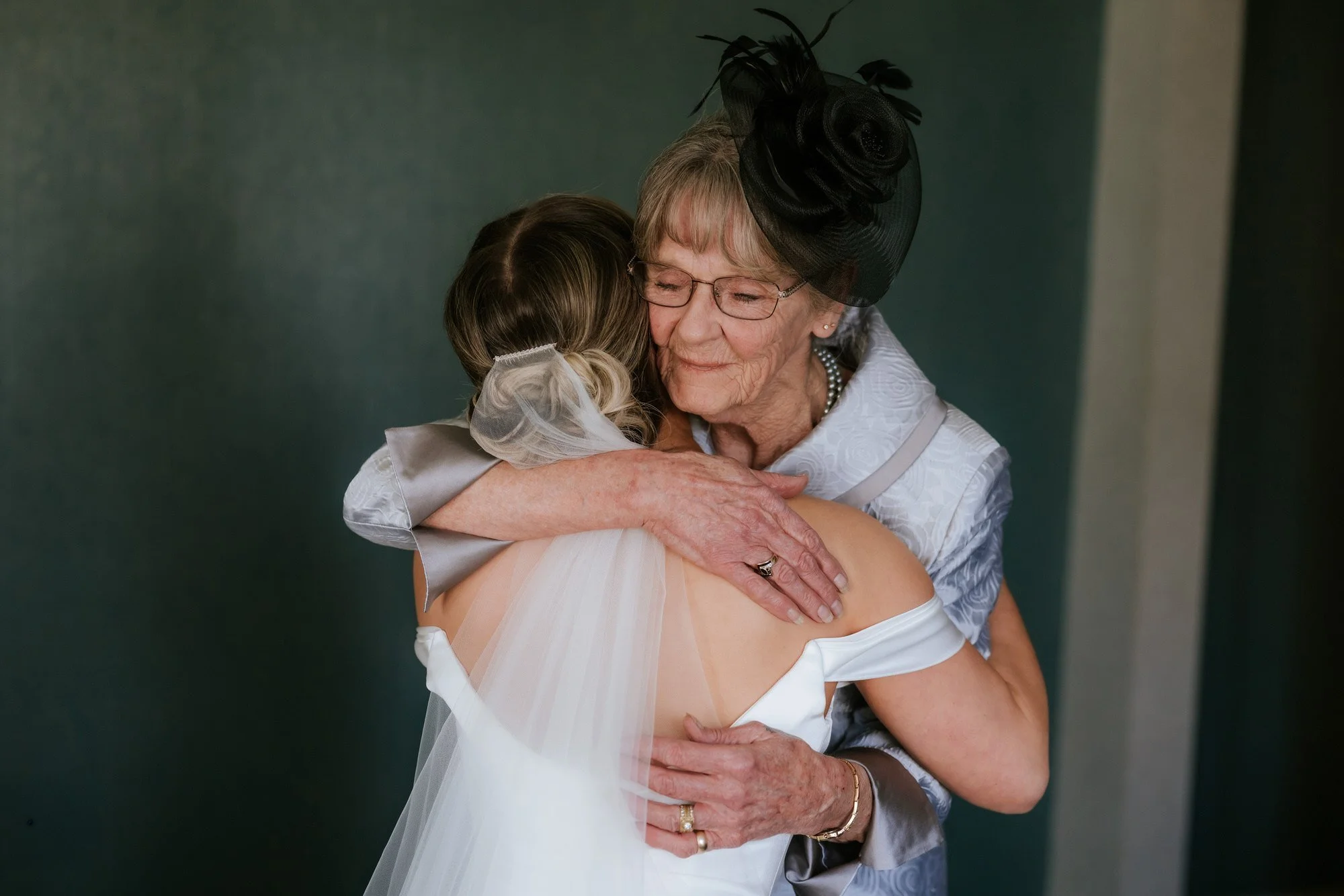 Elle embracing a loved one before the ceremony