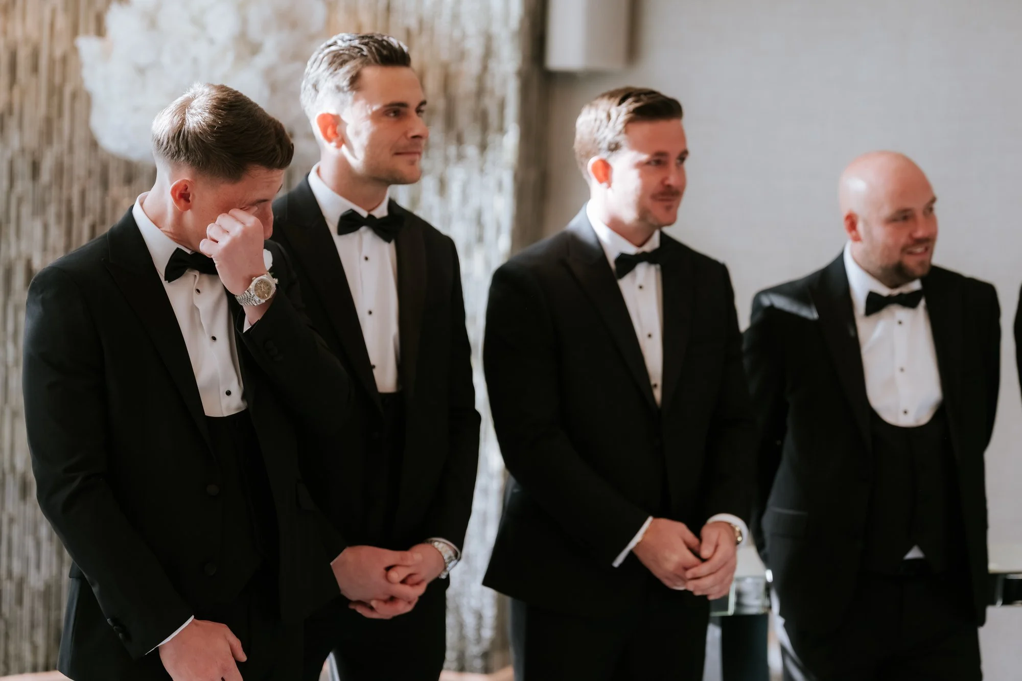 Aiden and his groomsmen waiting at the ceremony.