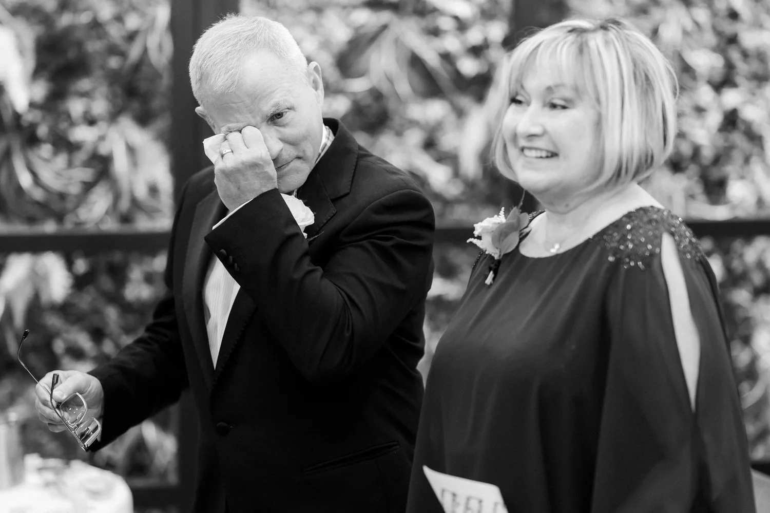 Allie’s dad wiping away a tear beside her mum during the ceremony.