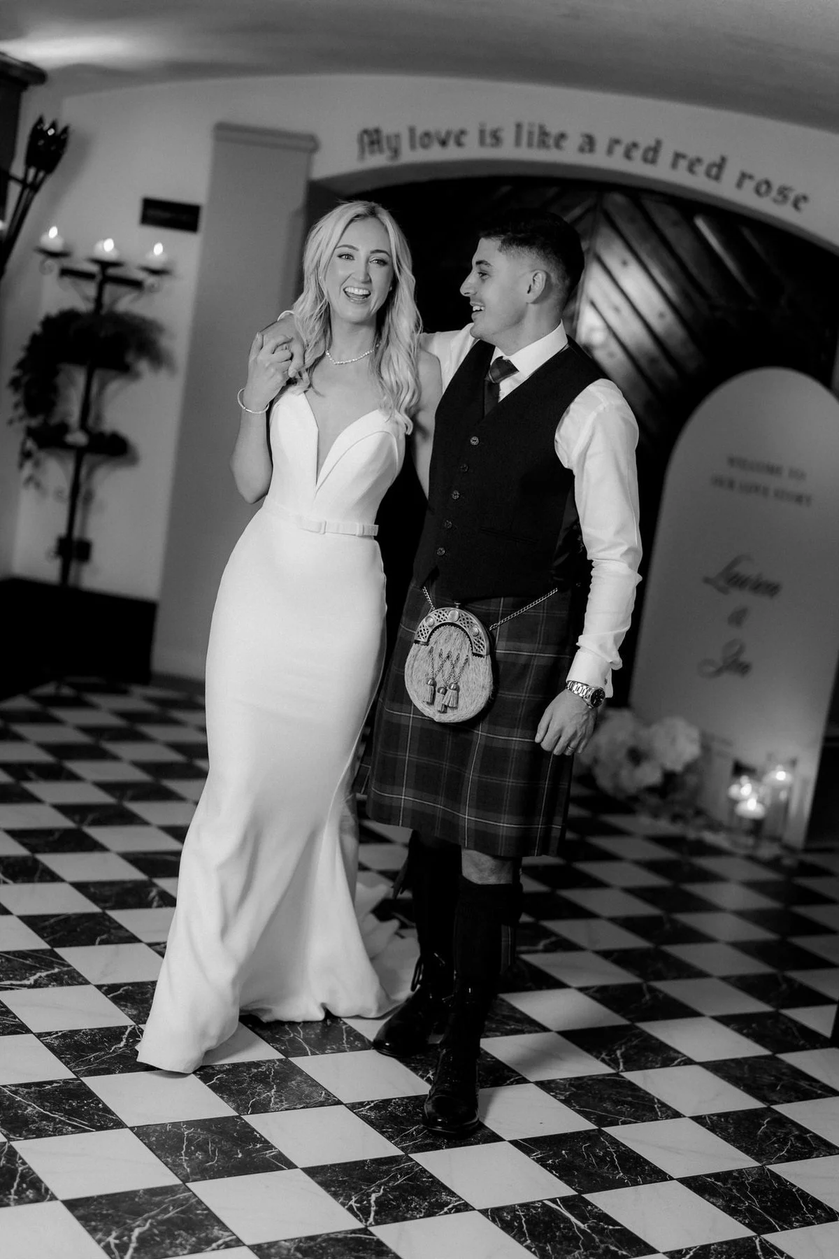 Black-and-white portrait of Lauren and Zen on Brig o’ Doon’s chequered floor.