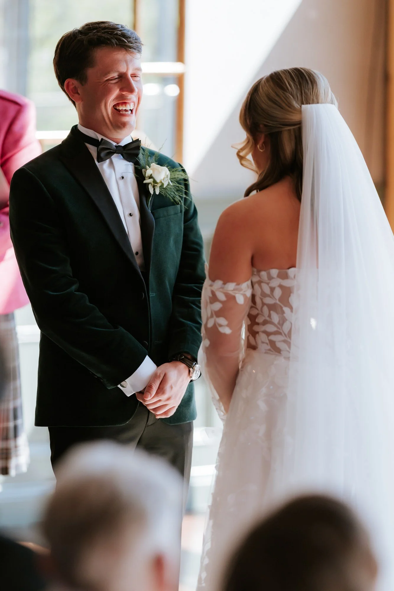 Jonathon laughing with Ciara during their ceremony.