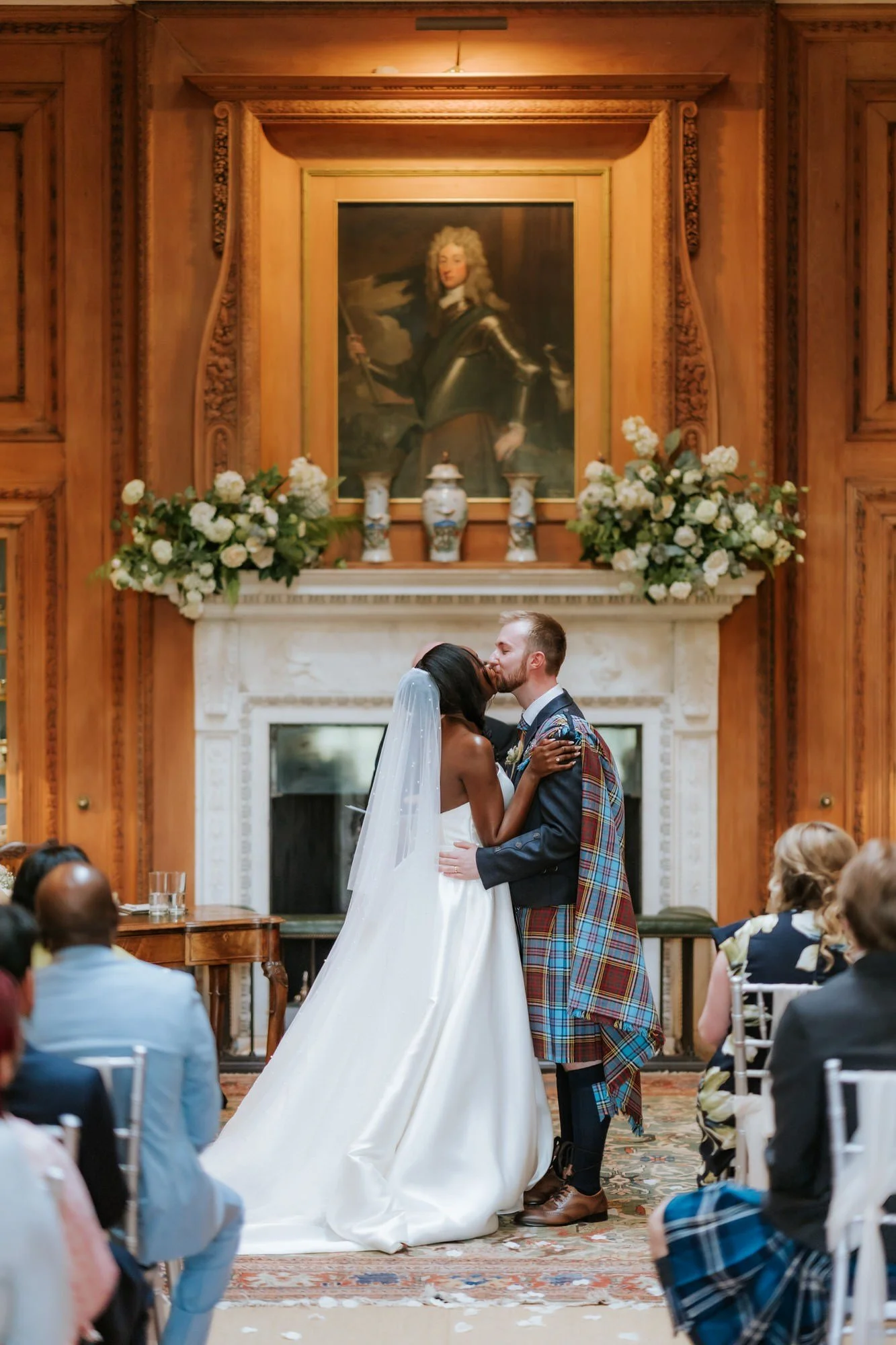 Kuda and Jamie sharing their first kiss in the Tapestry Room.