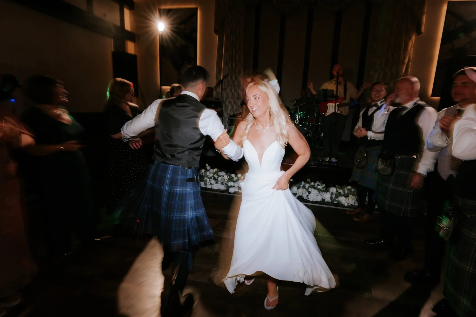 Lauren’s dress swirling as she dances with Zen at the evening reception.