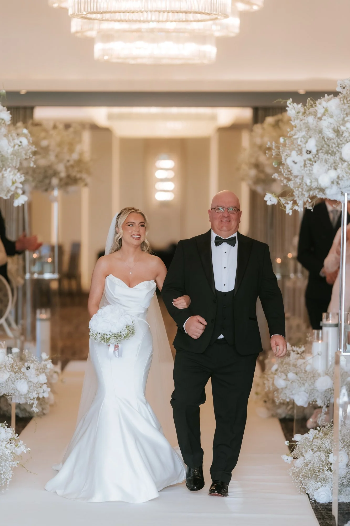 Taylor walking down the aisle at Lochside House Hotel.