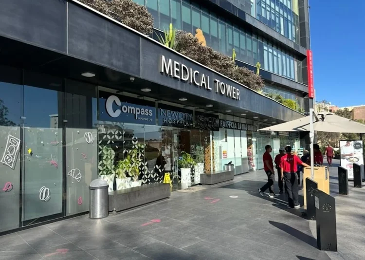 Lobby entrance of New City Medical Plaza in Zona Río, Tijuana — premium medical tower where Dr. Cedillo's psychiatric office is located