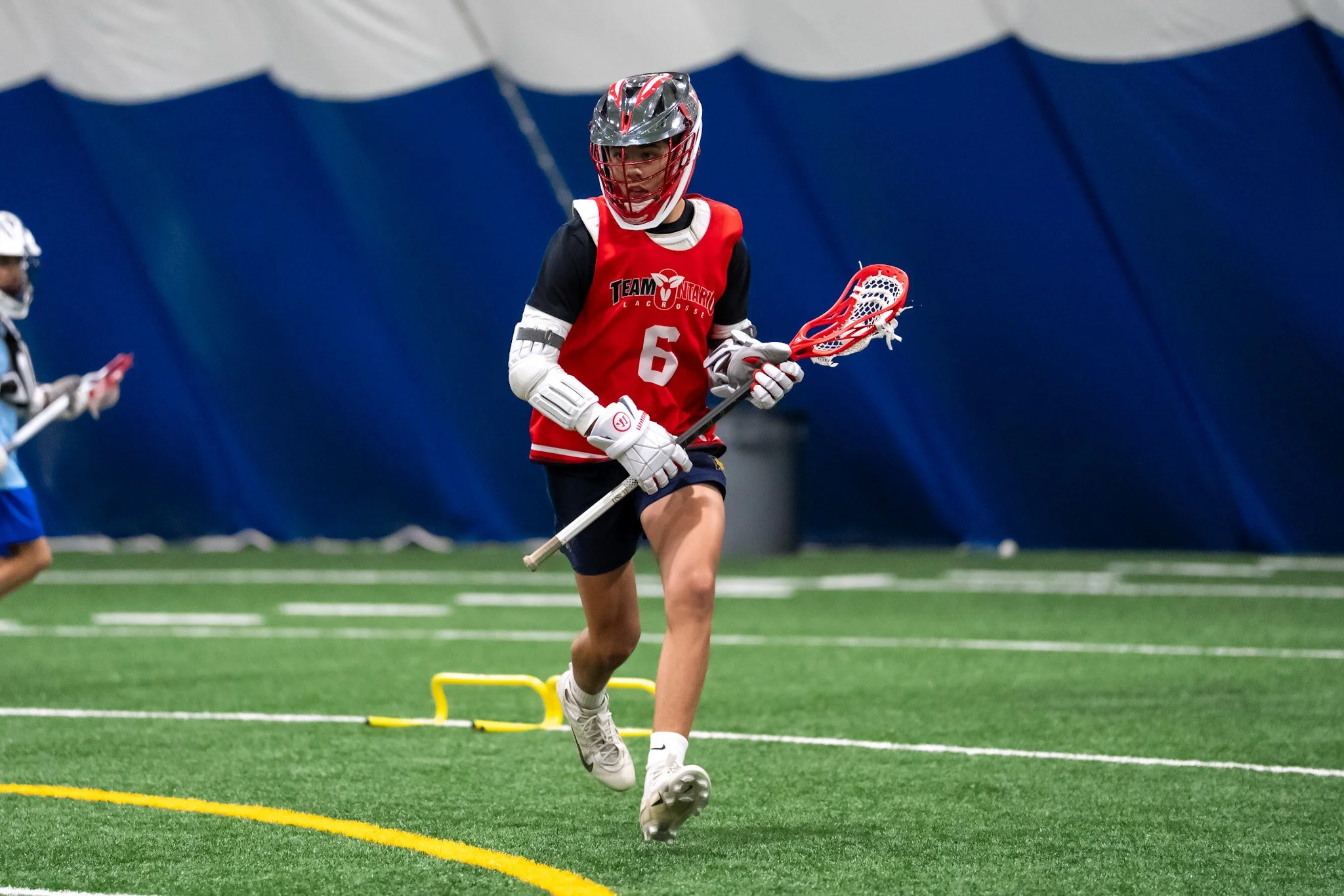 Players on the lacrosse field