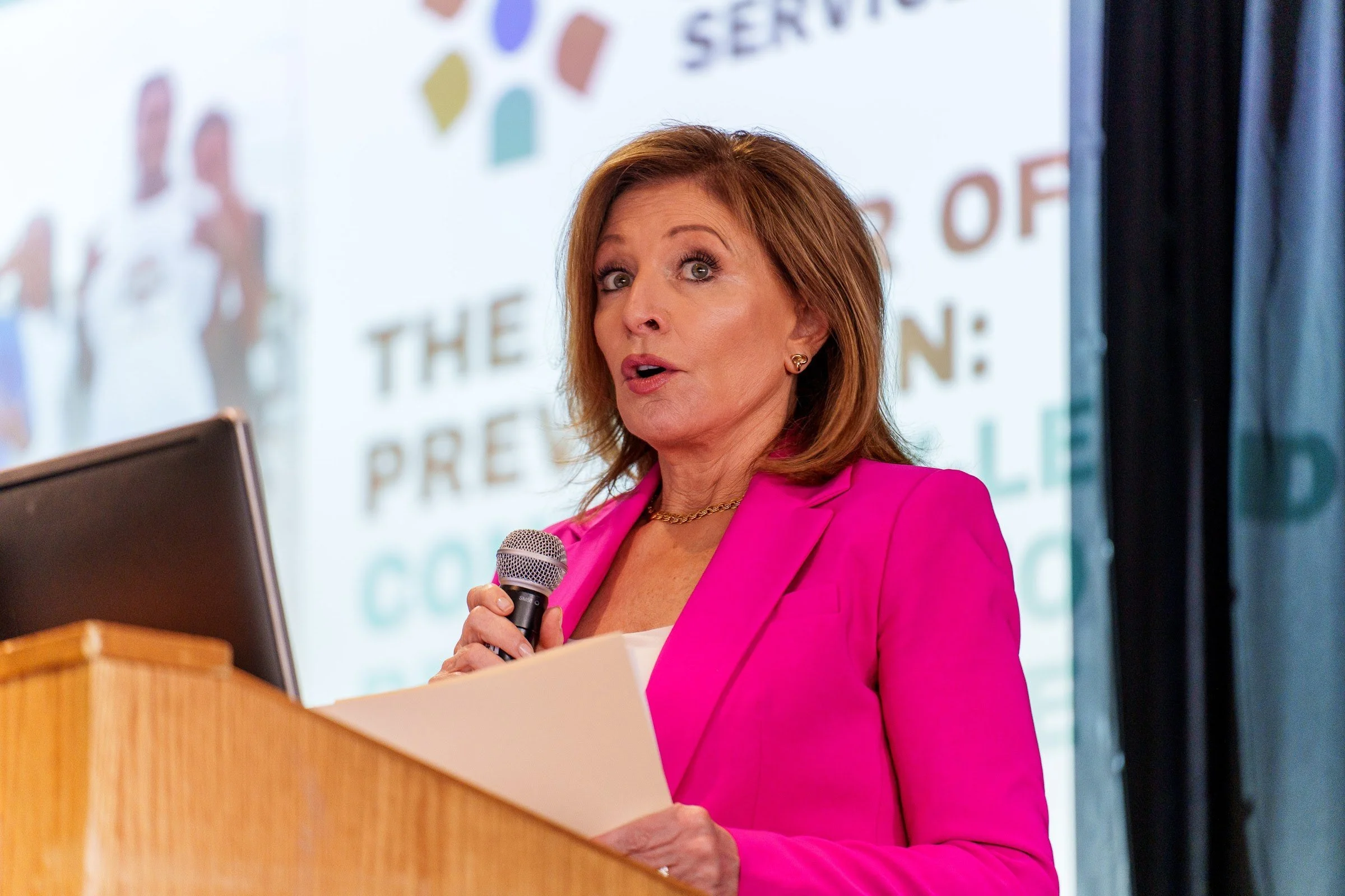 A speaker at the lectern