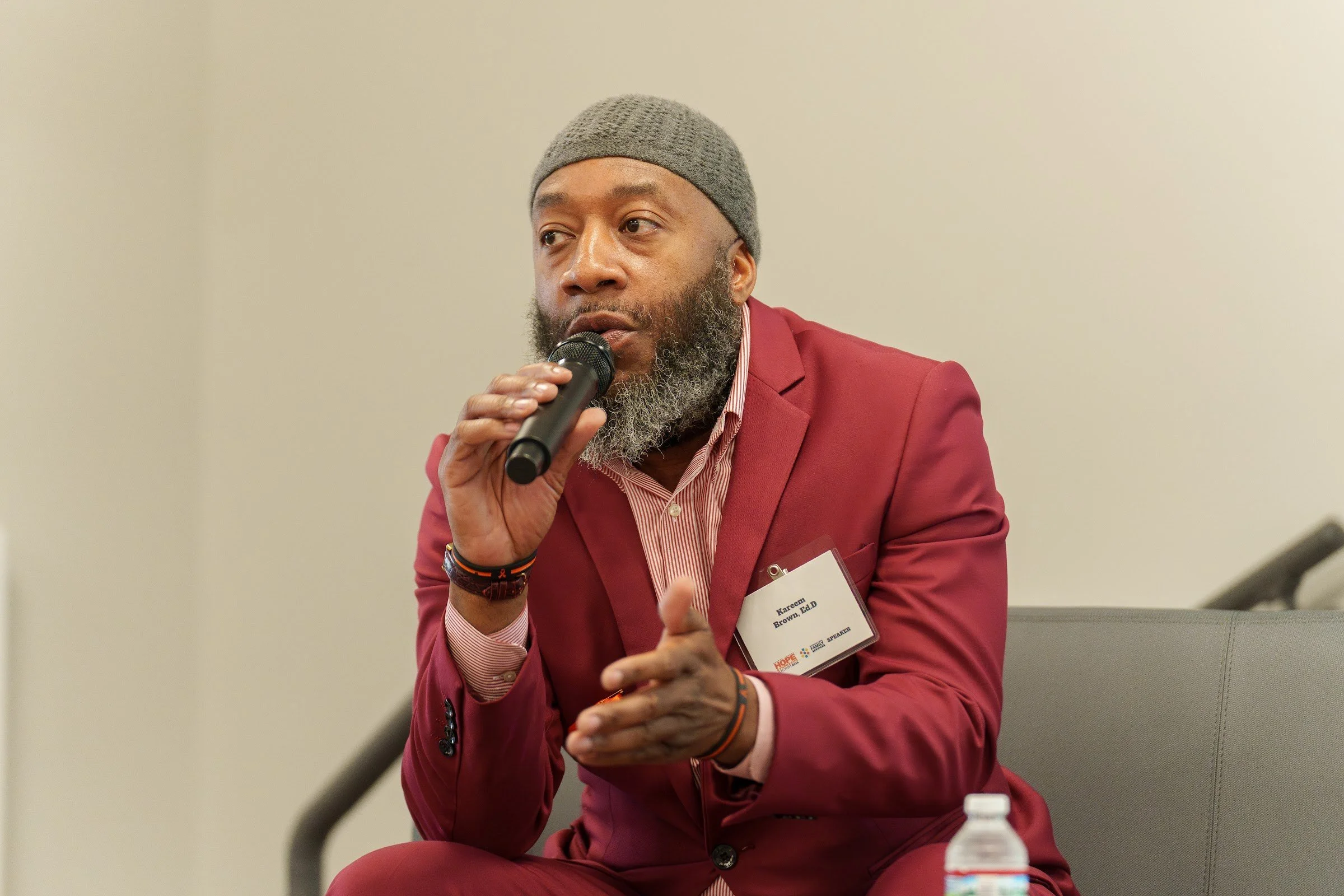 A speaker holding the microphone
