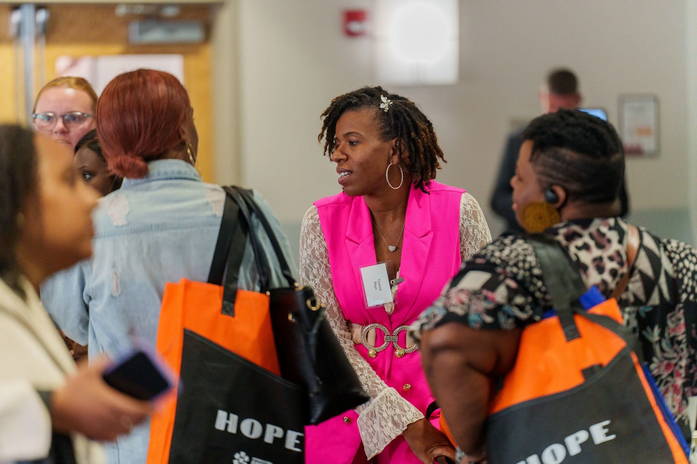 Attendees collecting HOPE materials