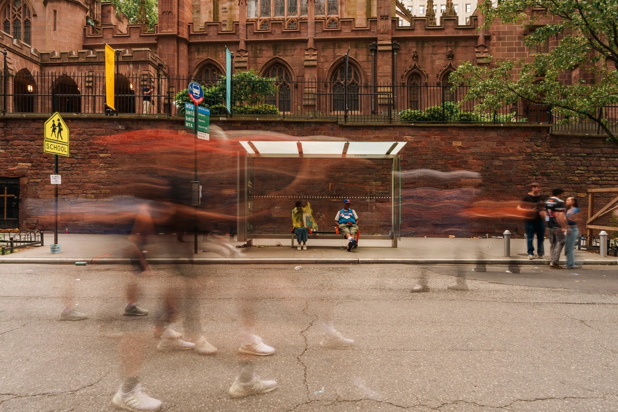Long exposure of the crowd moving through the street