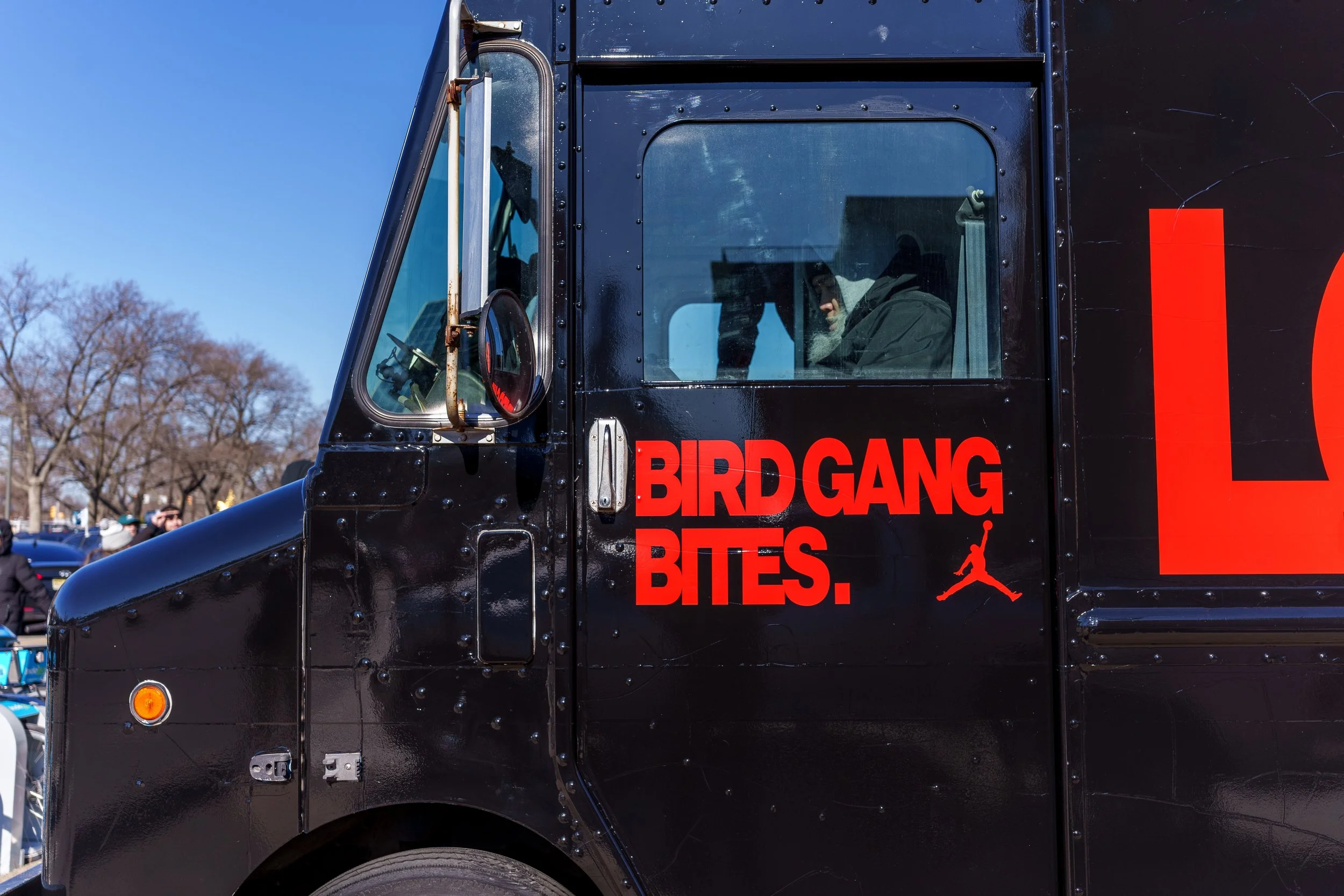 Jumpman logo and campaign type on the side of the Bird Gang Bites. truck