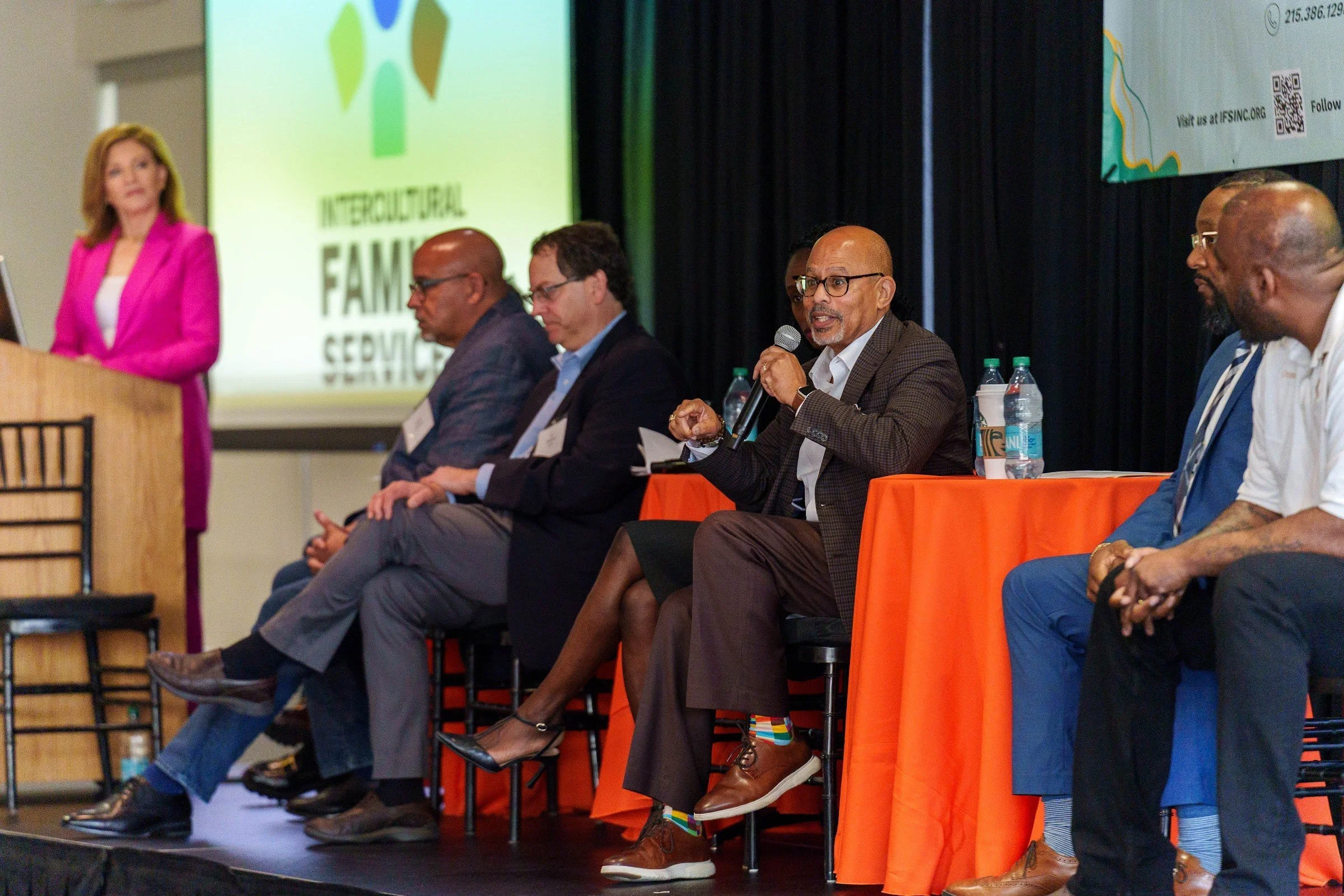 A wide view of the panel on stage