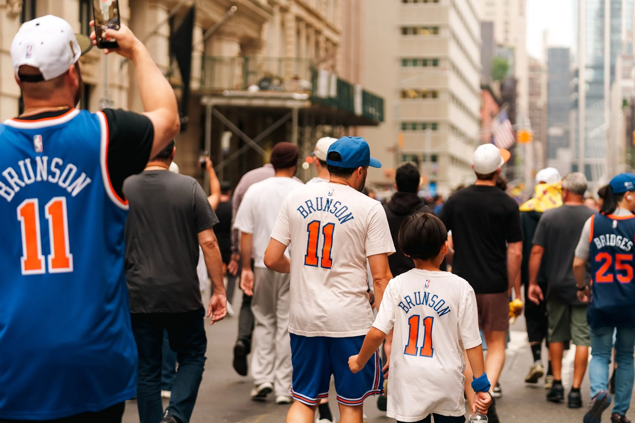Fans in jerseys watching together