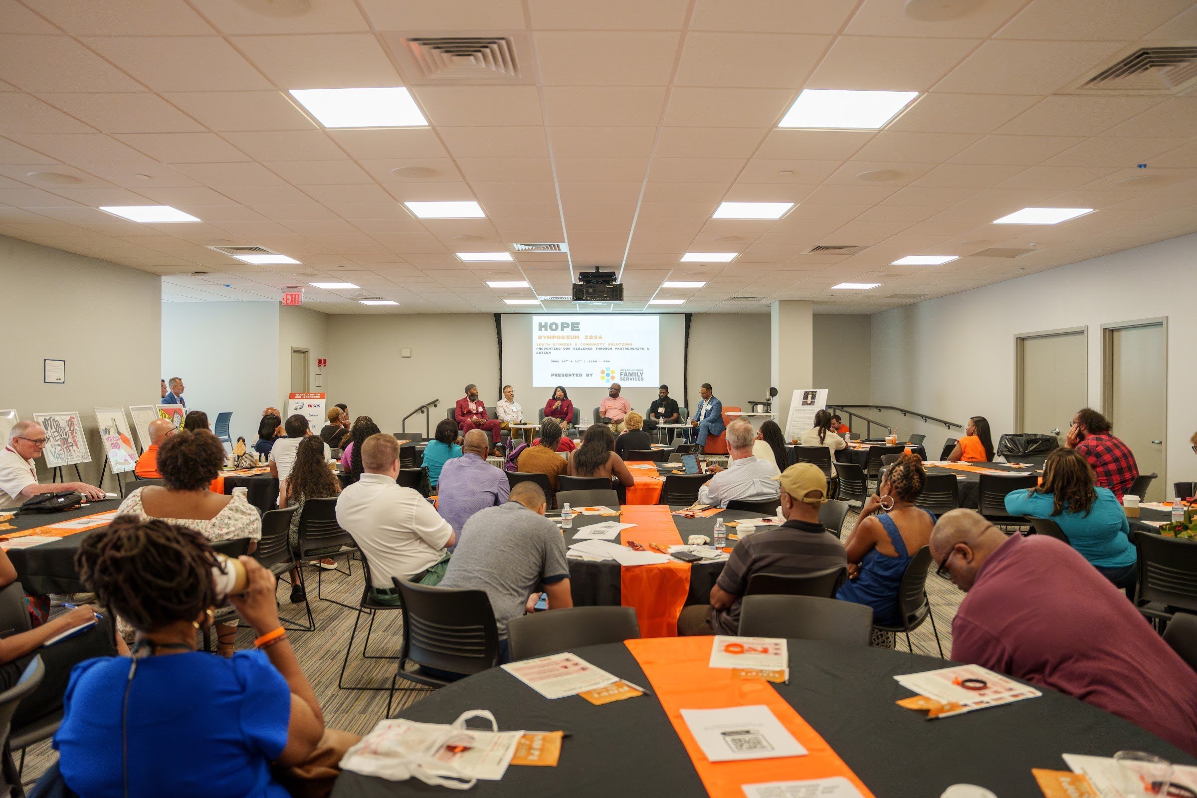 Attendees seated across the main room