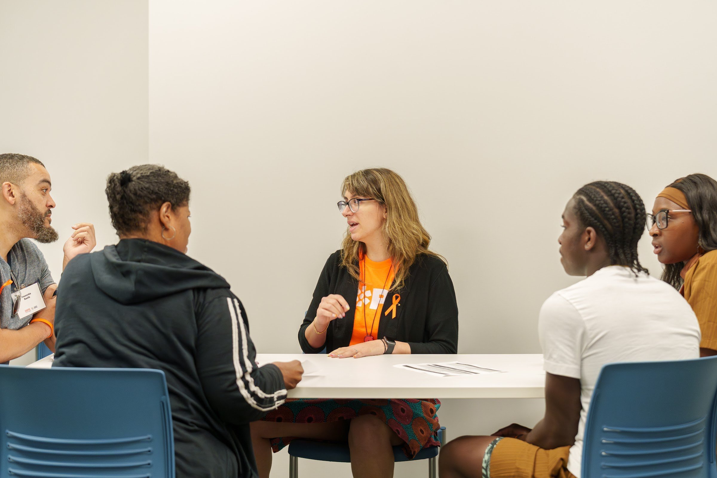 A facilitator working with a small group