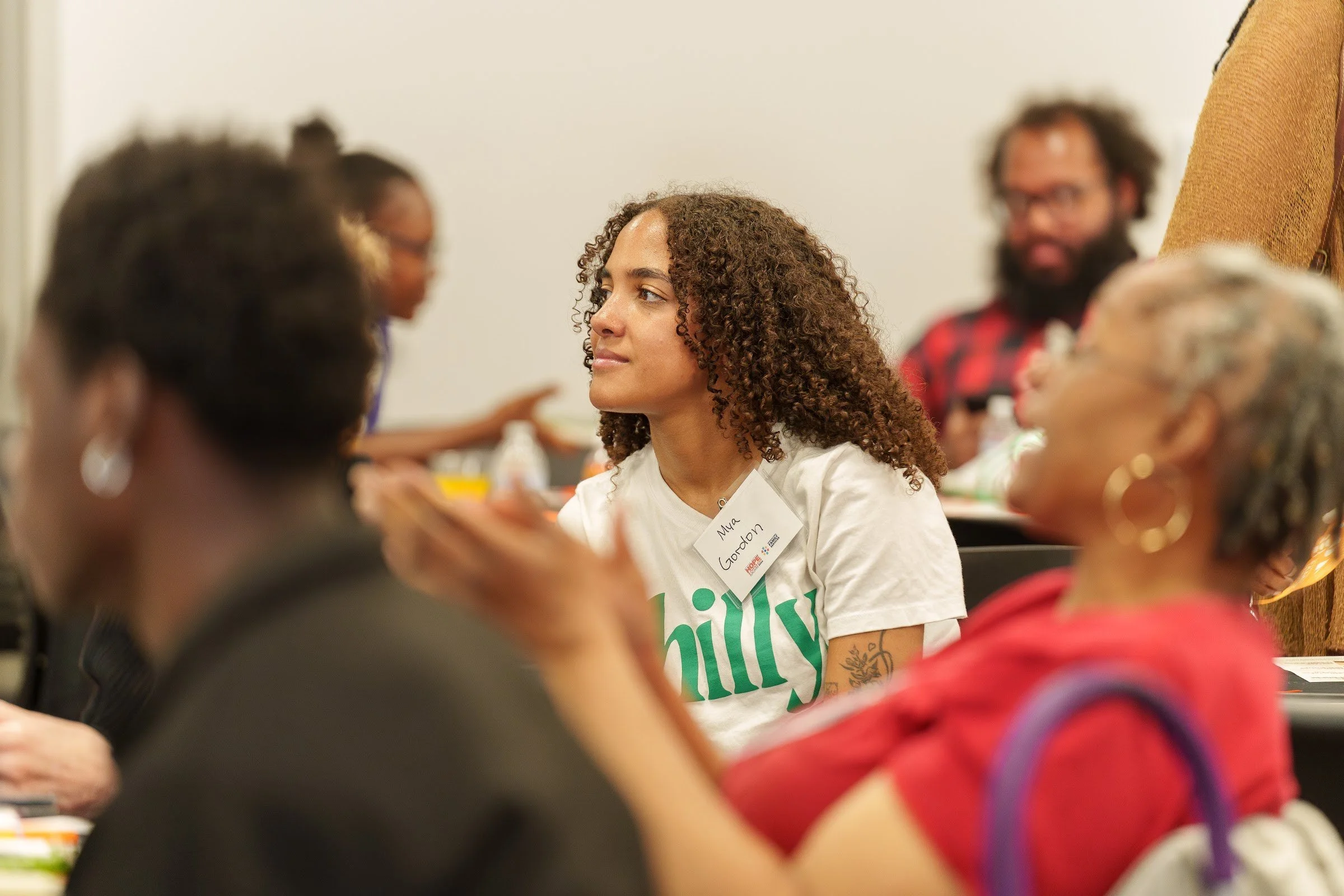 Attendees listening during a session