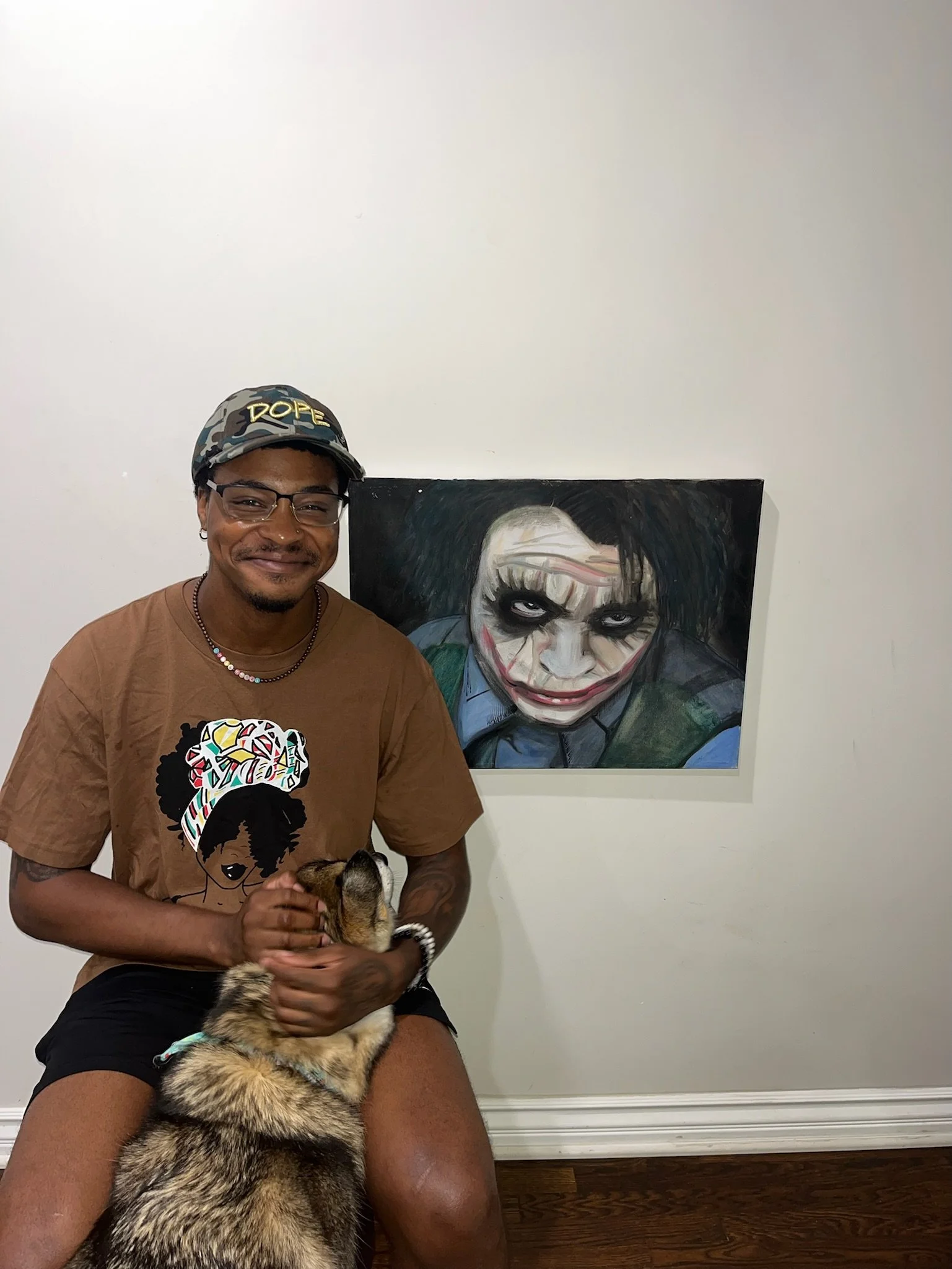 Chris Gaston with The Joker painting