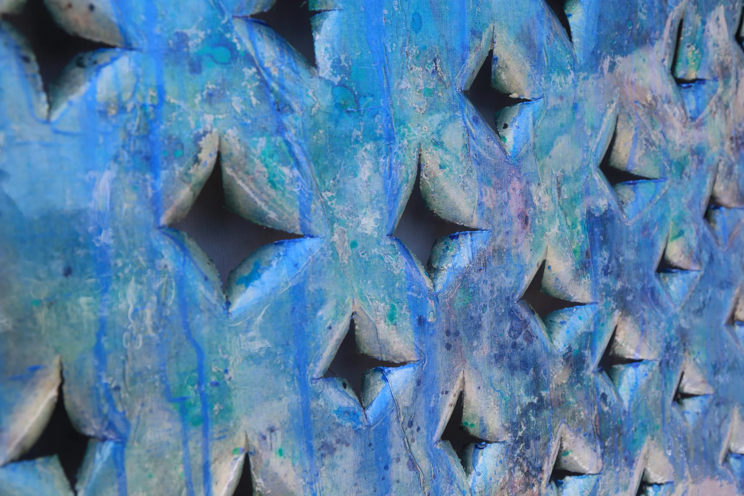 Sculptural blue geometric artwork by Terrell Moore