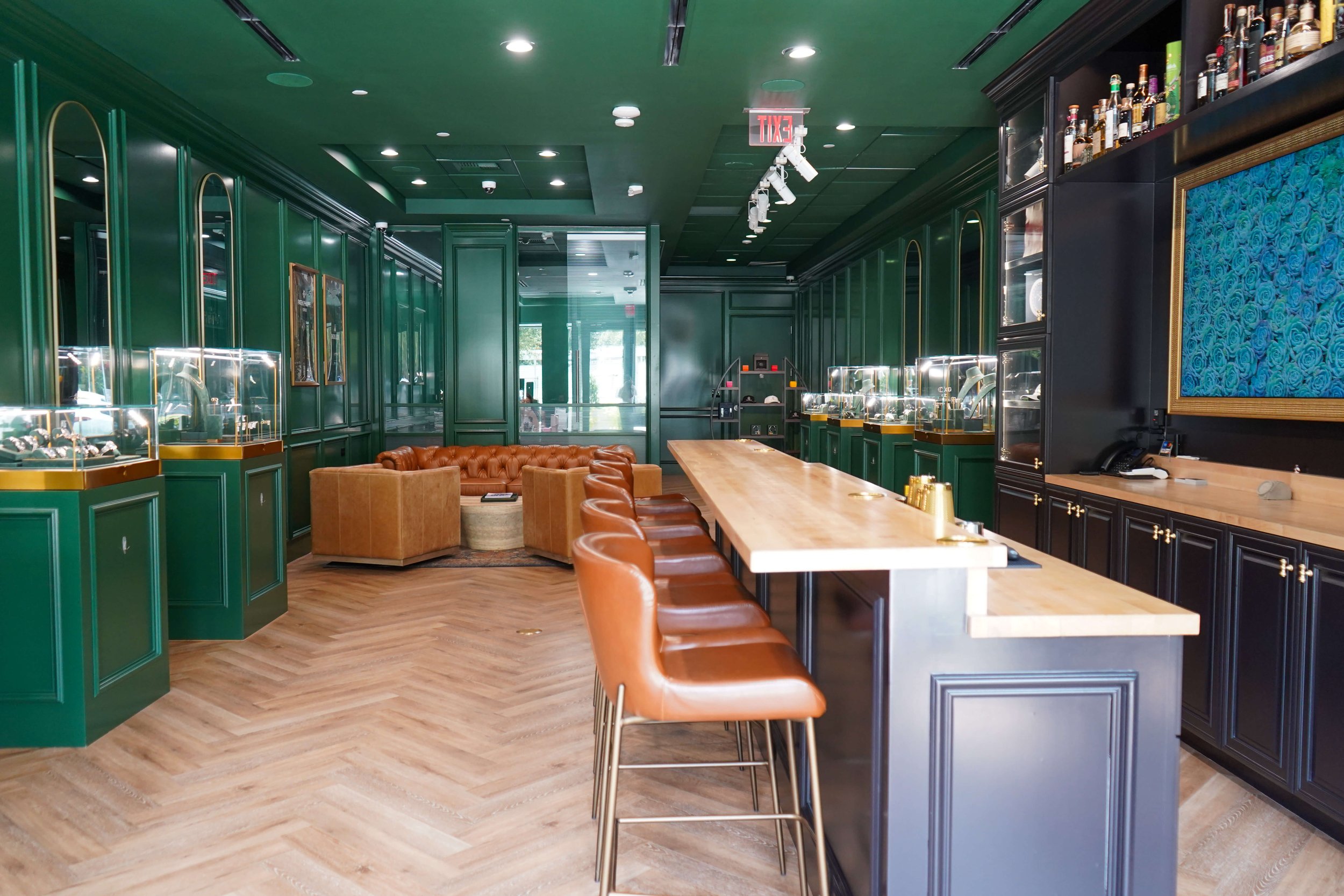 Seating area and watch tray inside The Crown Houston watch store in Uptown Houston