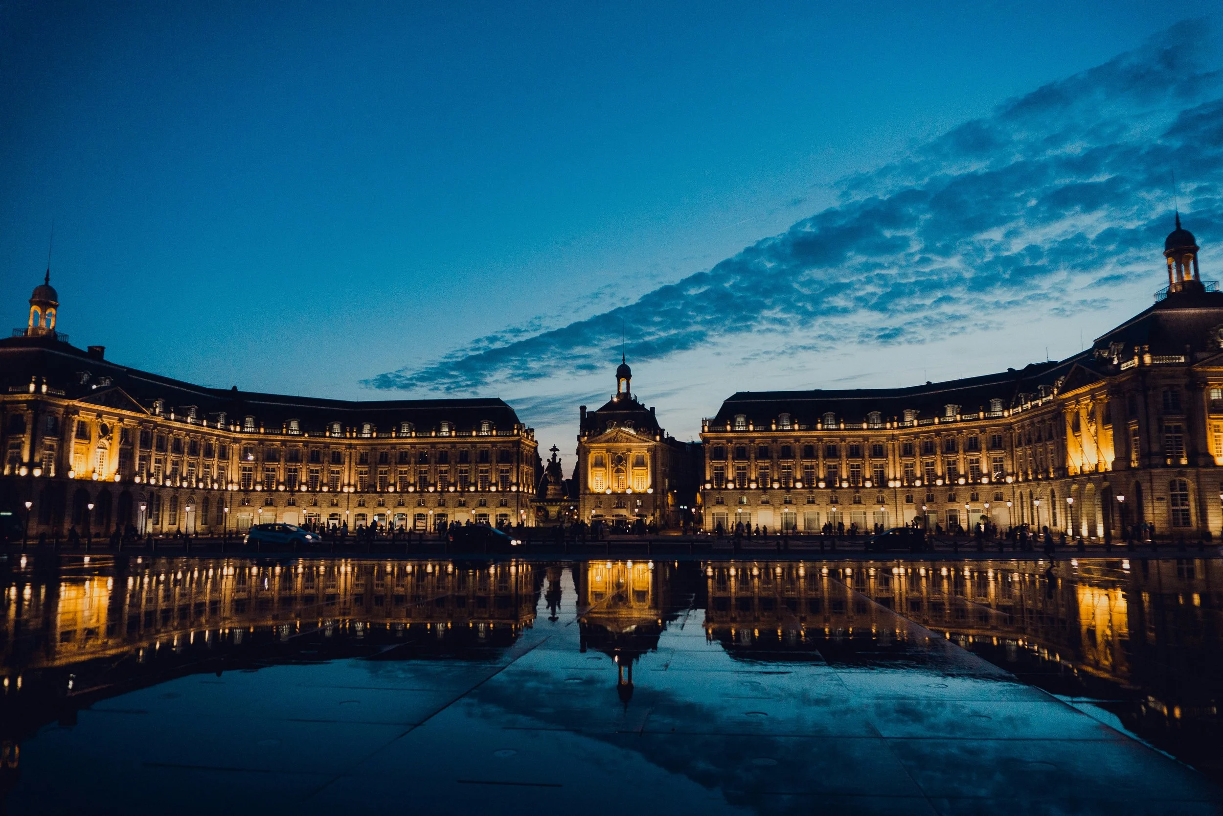 Bordeaux — Place de la Bourse reflected in the Miroir d'Eau, or a Medoc vineyard at harvest