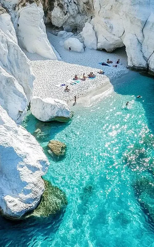 Milos — Sarakiniko white volcanic rock formations or Kleftiko sea caves