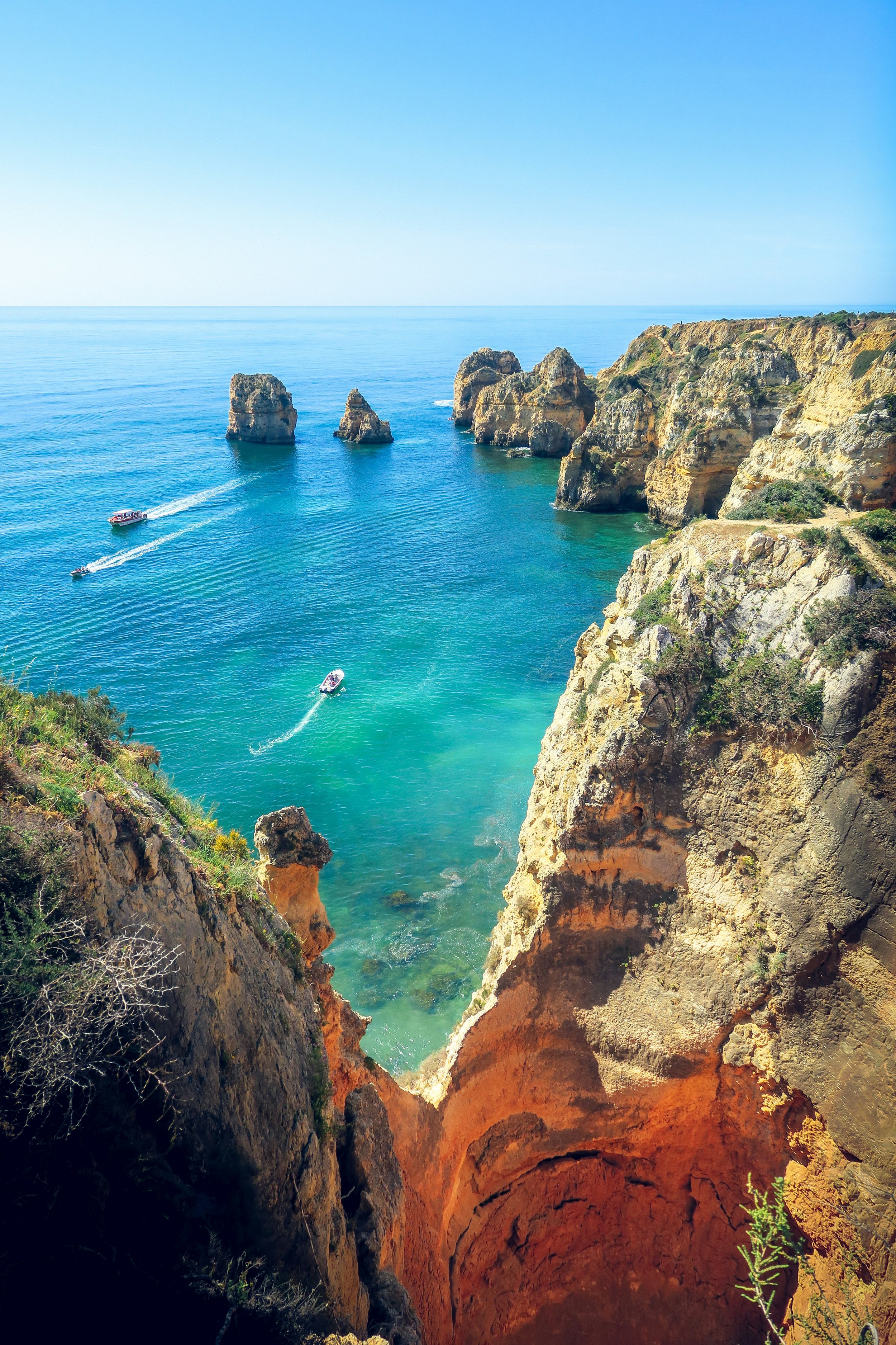 Algarve — ochre limestone cliffs and arched rock formations at Ponta da Piedade