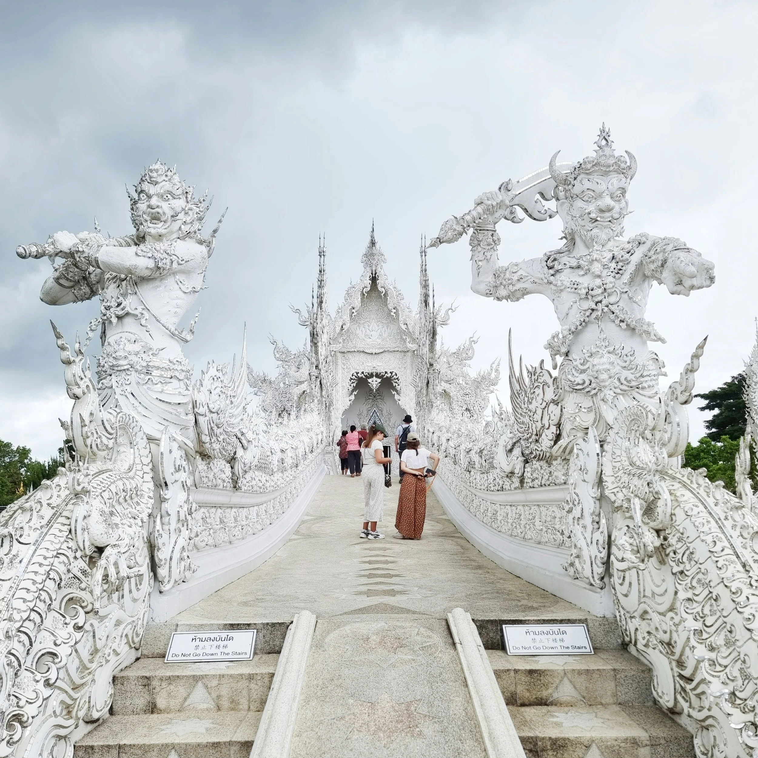 Chiang Rai — White Temple exterior or Blue Temple interior at dusk