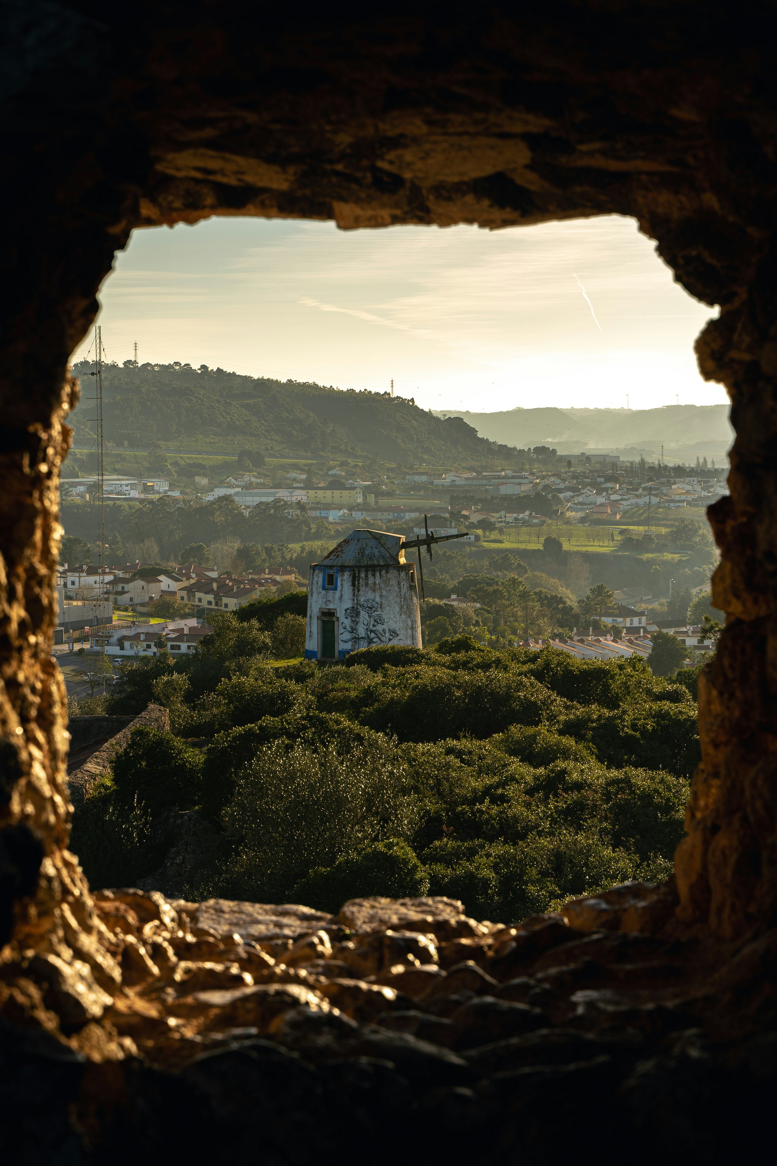 Obidos — whitewashed village with blue-trim houses inside the medieval walls