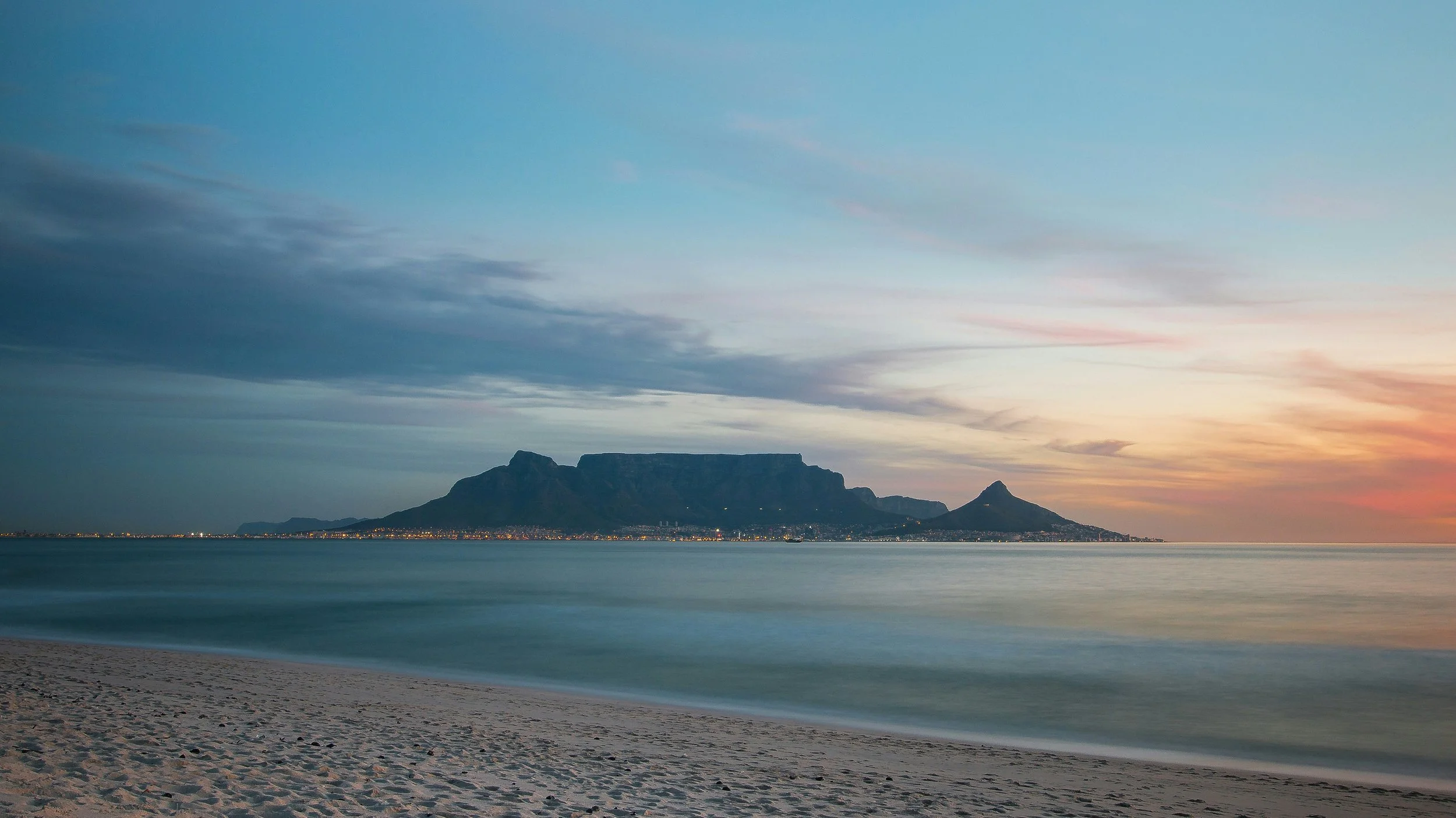 Cape Town — Table Mountain from the Waterfront or Camps Bay at dusk