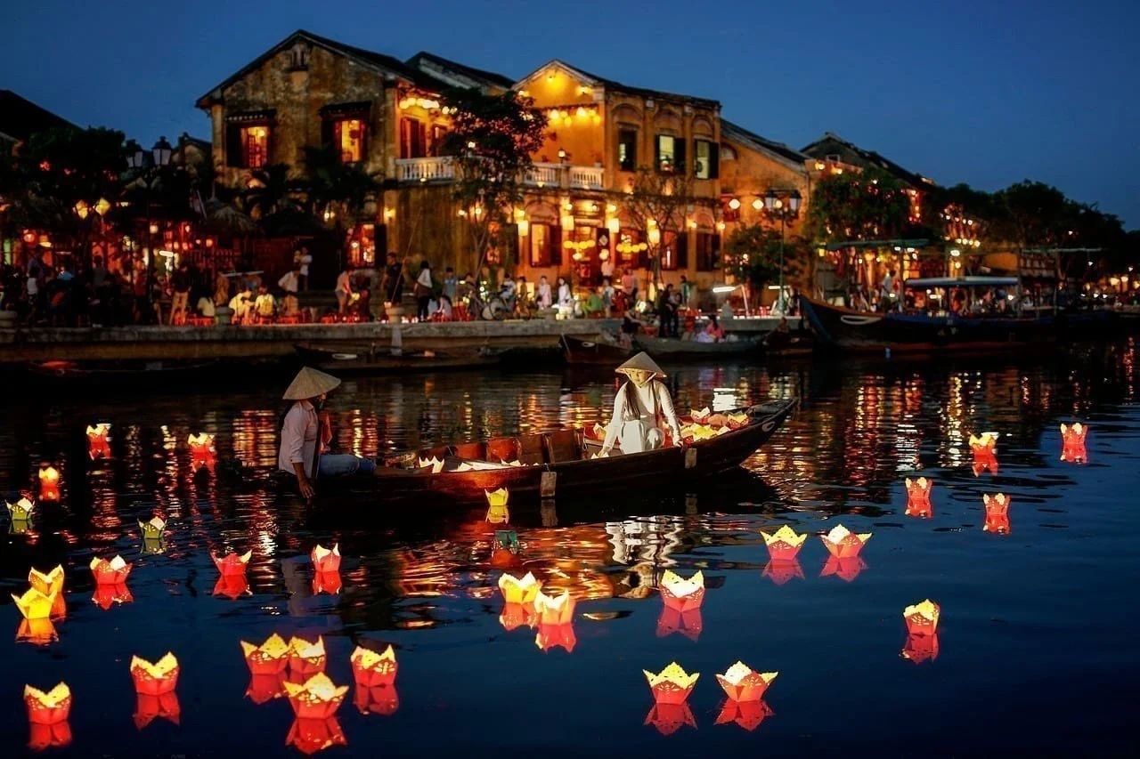 Hoi An — lantern-lit Ancient Town at night or Japanese Covered Bridge