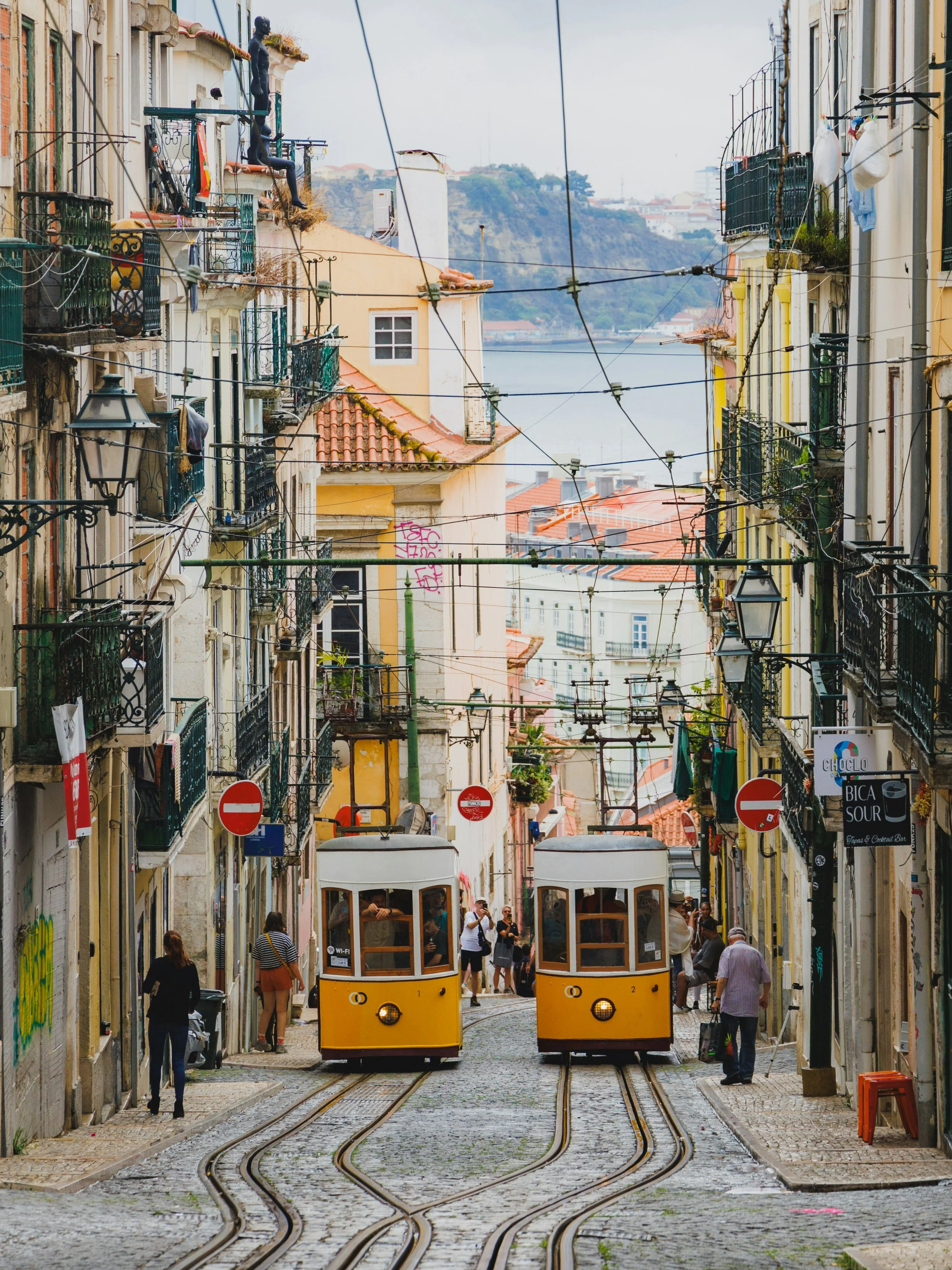 Portugal travel — tram in Lisbon, azulejo tile, or Douro vineyard