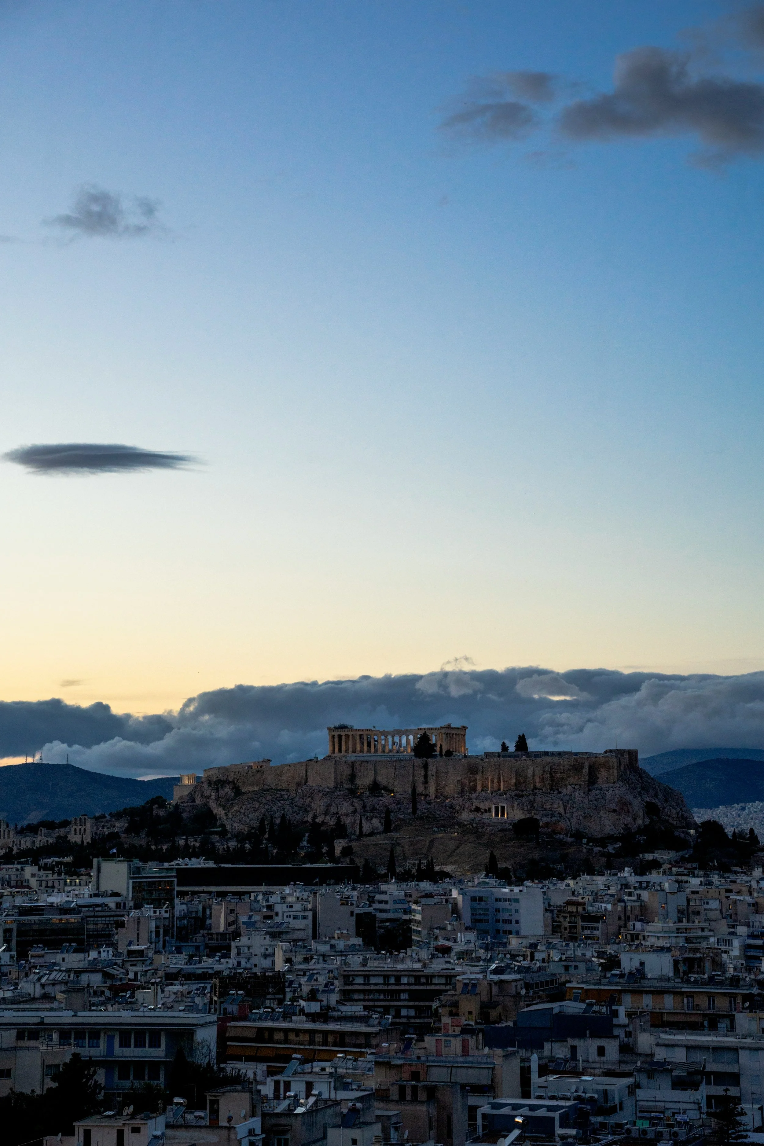 Athens — Acropolis at golden hour or Monastiraki rooftop at dusk