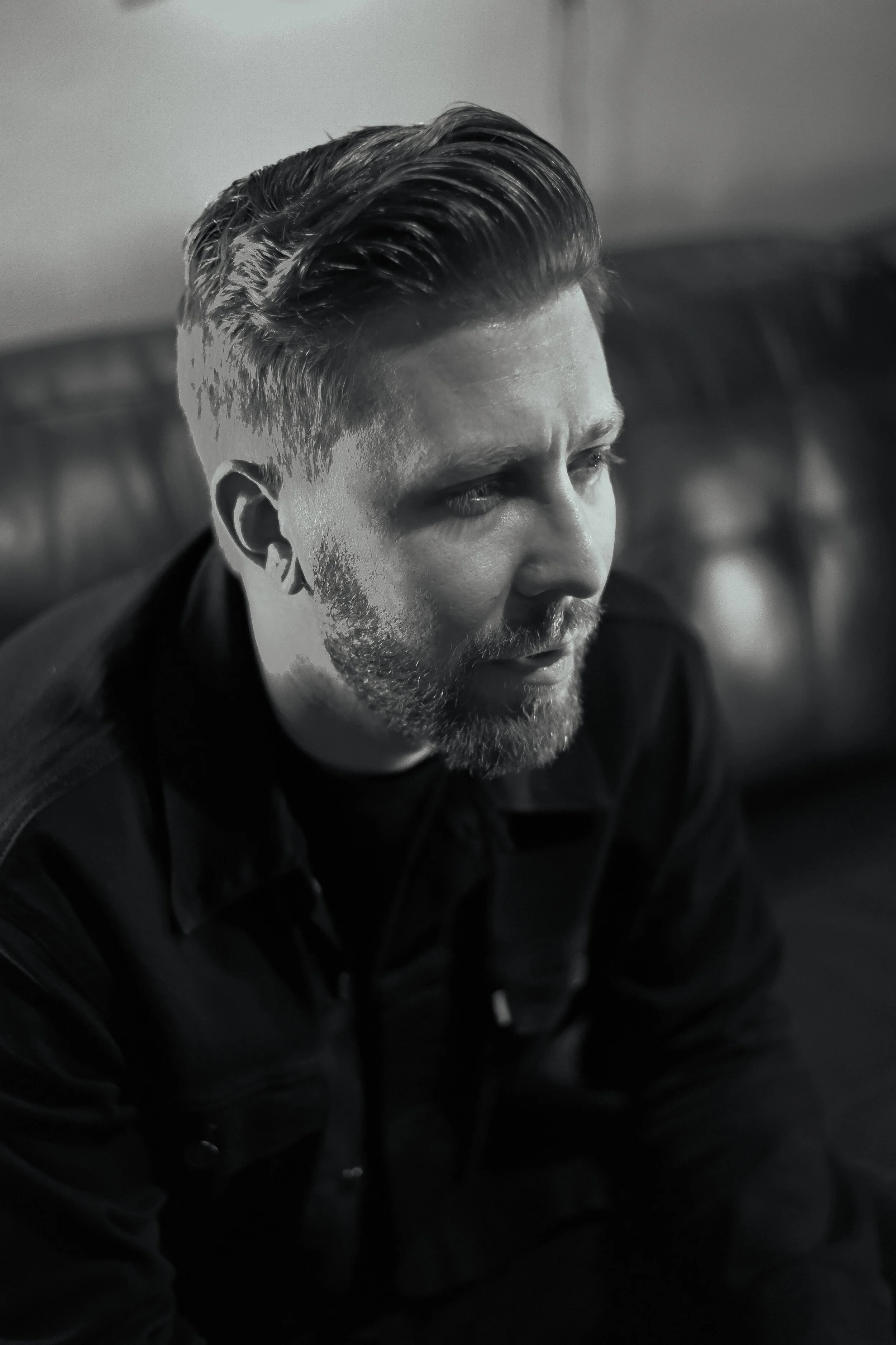 Black-and-white portrait of REZ HITS
