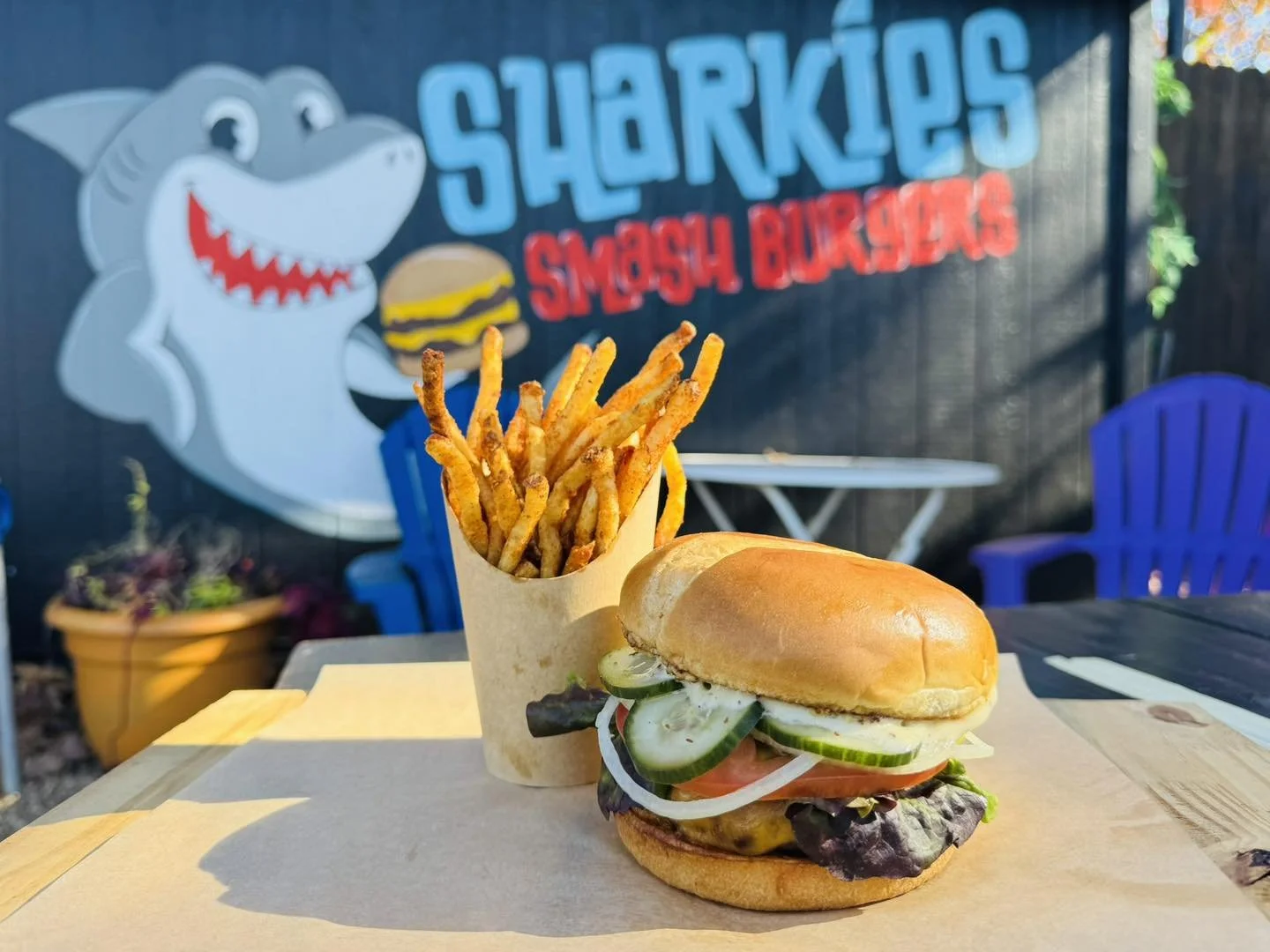 Sharkie's Smash Burgers patio at Mabank food truck yard