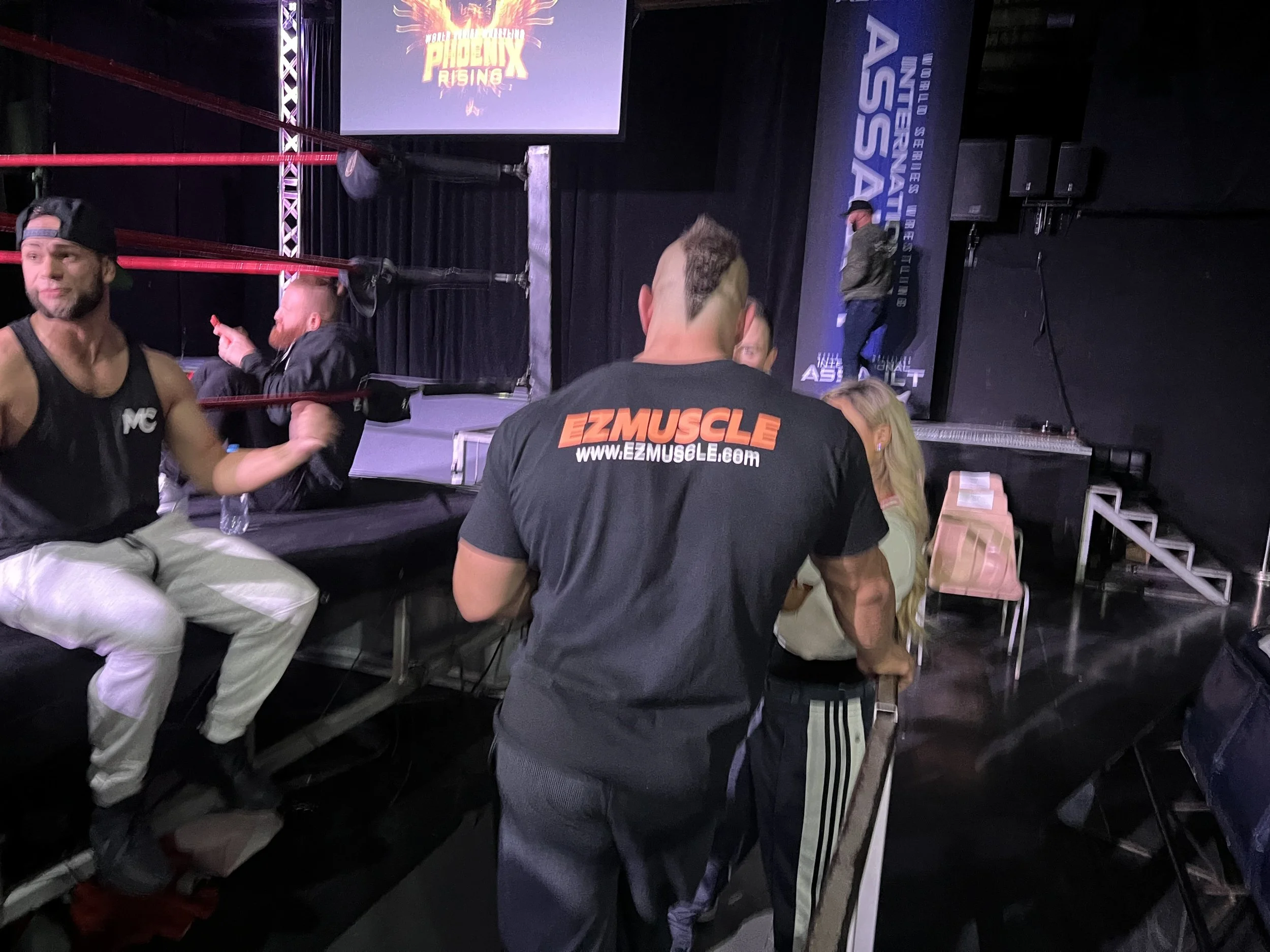 Brian Cage wearing an EZMUSCLE shirt