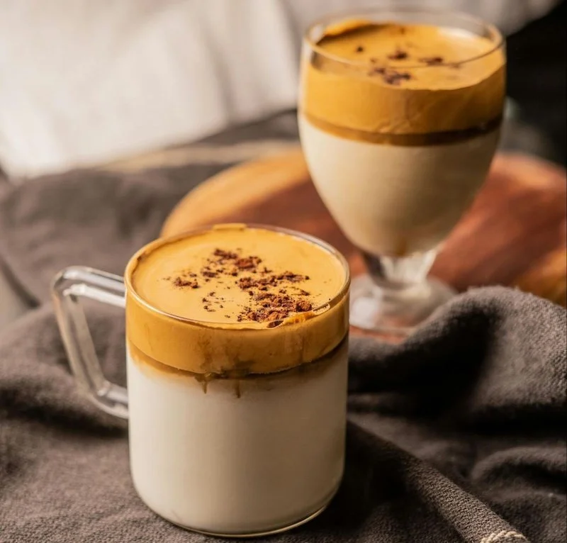 Golden turmeric latte in two glasses