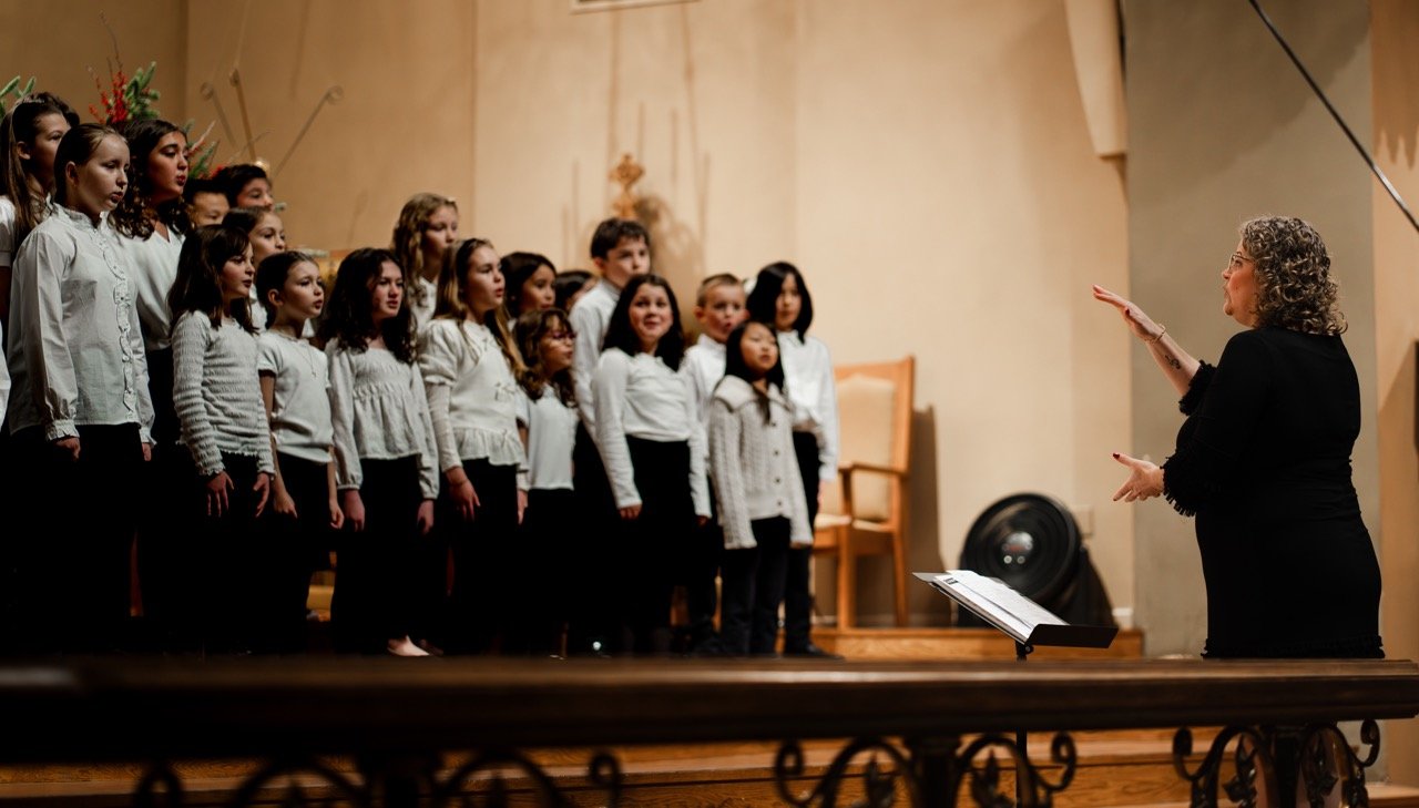 Nova 2 singers in rehearsal