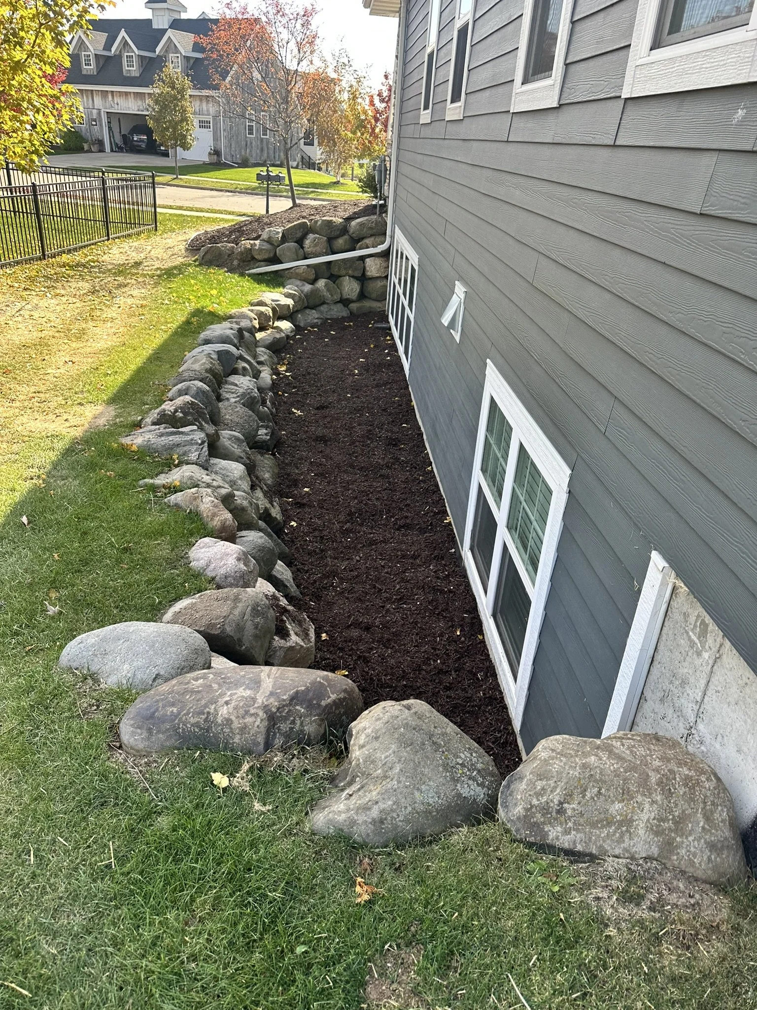 Mulch bed installation in Bishops Bay, Middleton WI by YD Exterior Visions