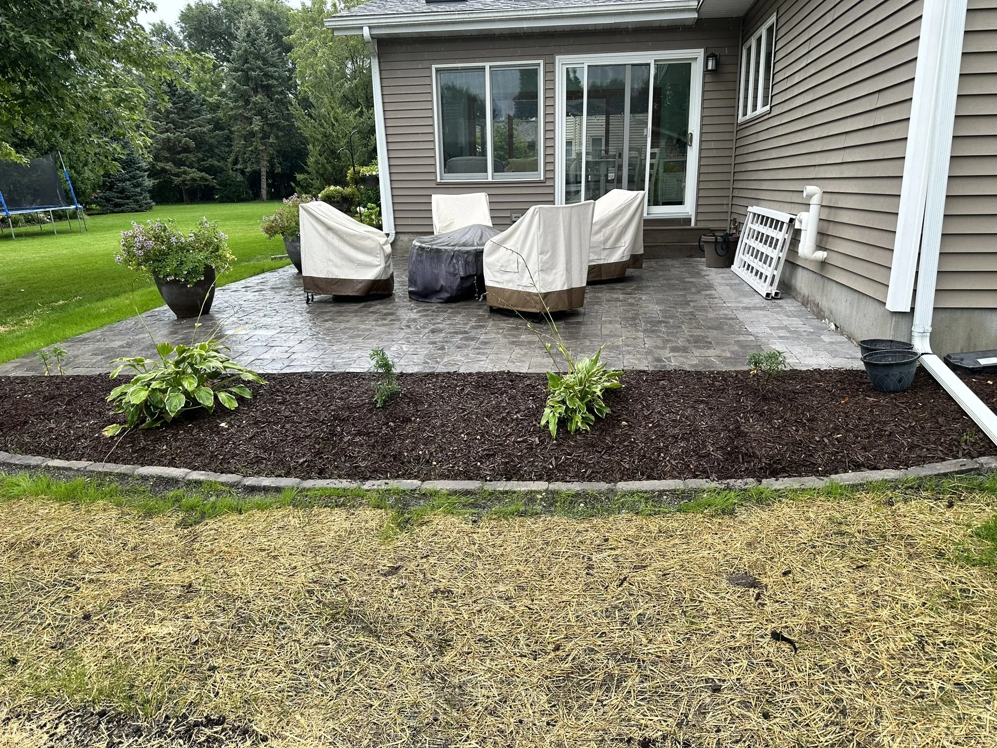 Paver patio installation in Wexford Village, Madison WI by YD Exterior Visions