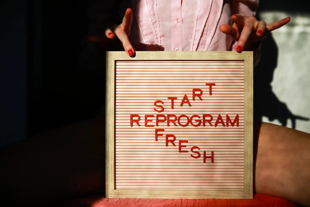 Image of a signboard that says Restart, Reprogram, Refresh