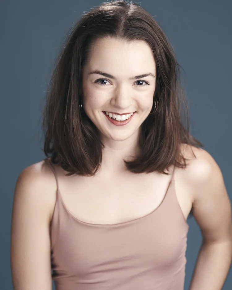 Actor headshot of a smiling young woman, NYC studio session