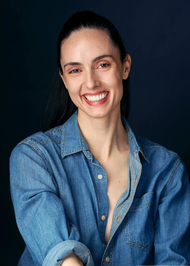 Actor headshot smiling in denim, bright and approachable, New York City