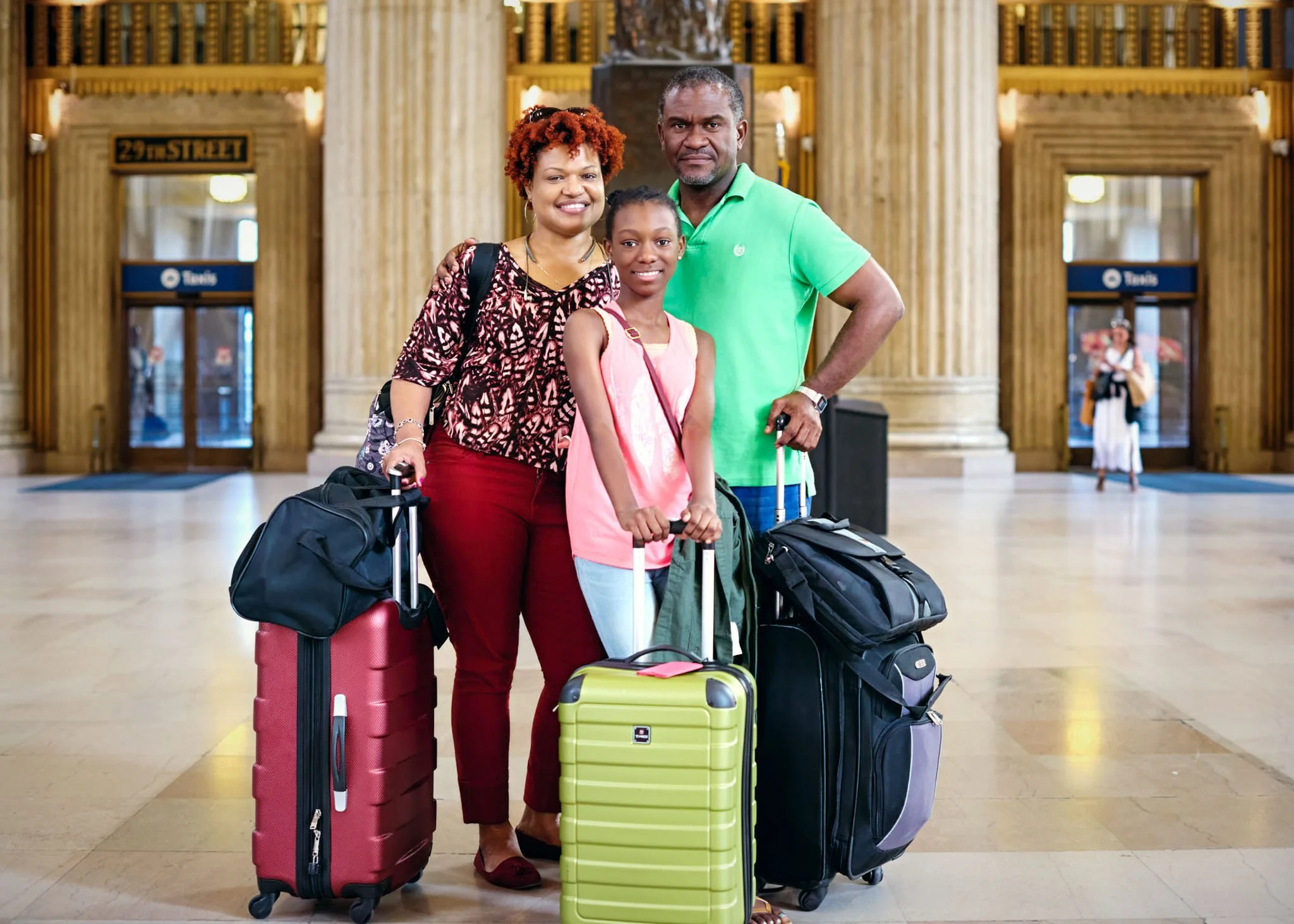 Corporate portrait photography NYC editorial commission family with luggage train station New York David Pexton Photography