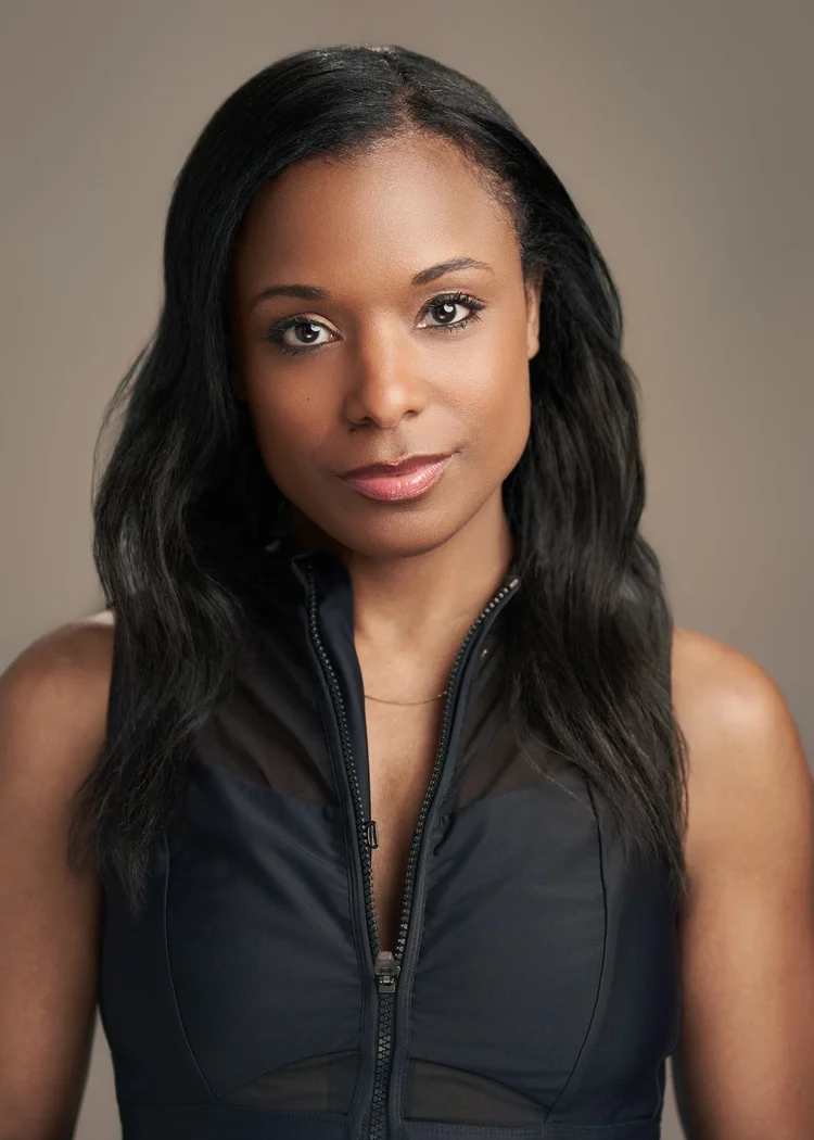 Clean modern actor headshot with soft background blur and direct eye contact, NYC